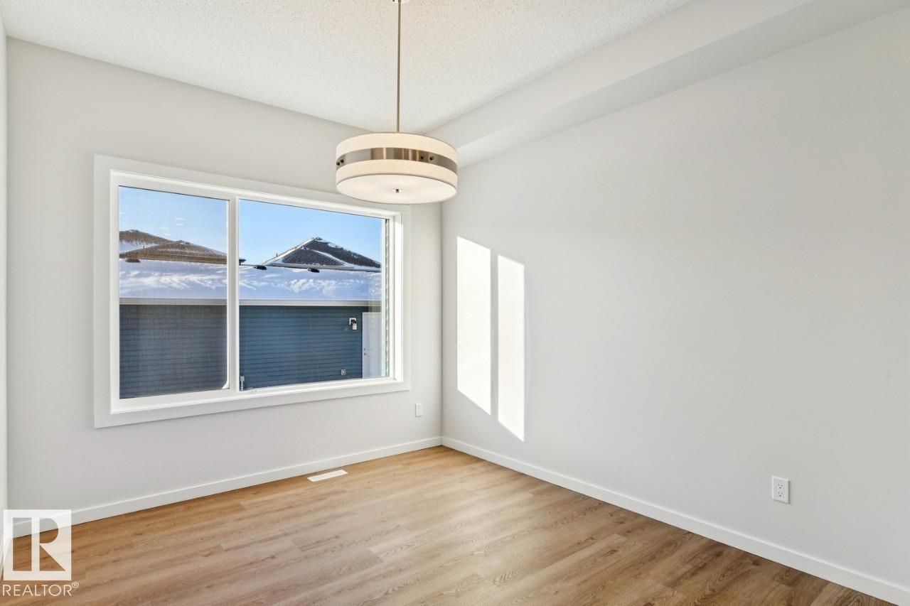 Photo 13 at 318 26 Street SW, Alces, Edmonton