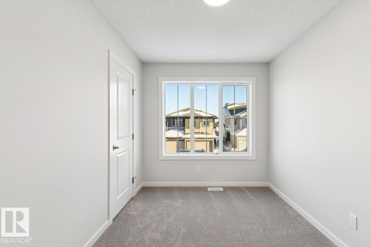 Photo 23 at 318 26 Street SW, Alces, Edmonton