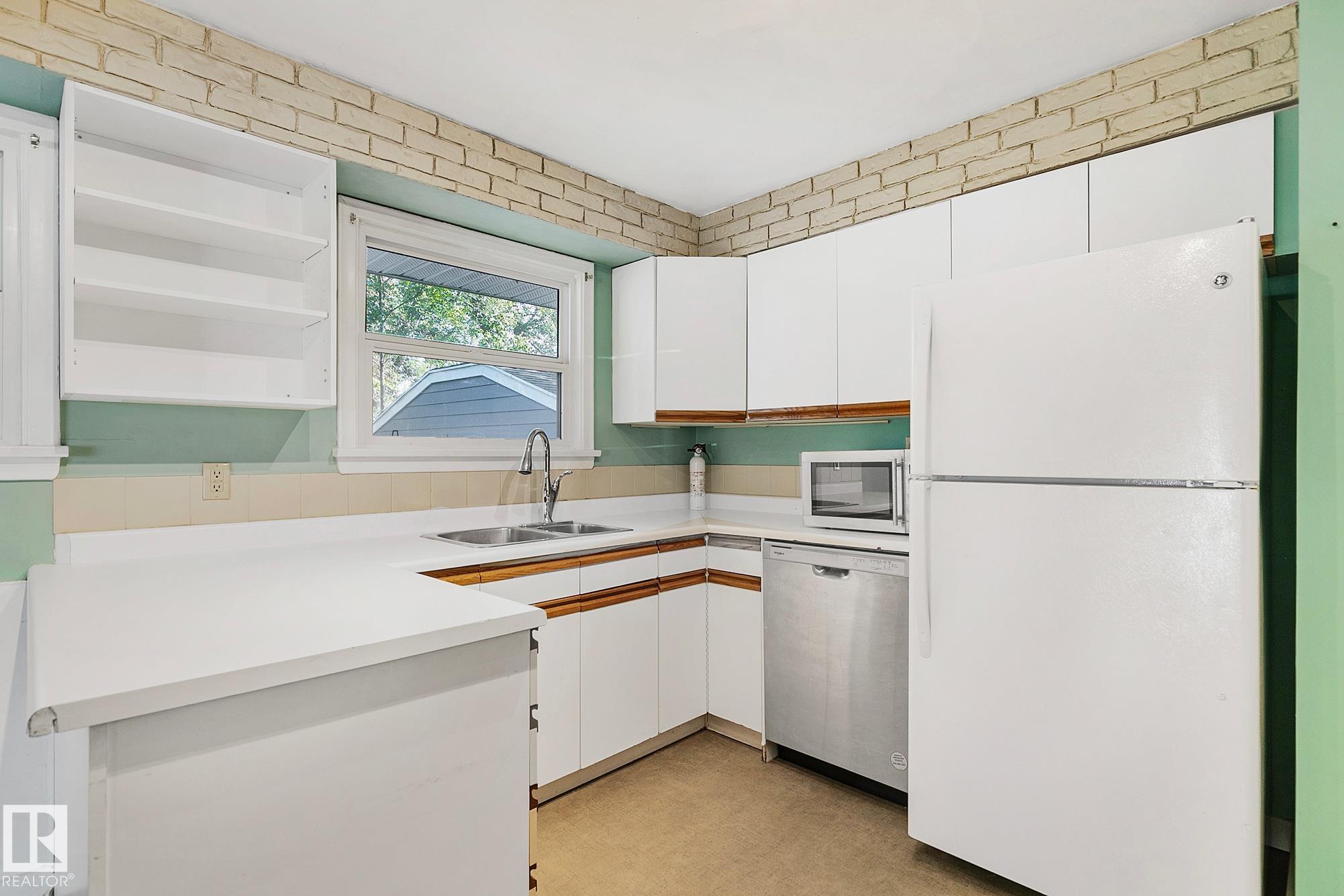 Photo 12 at 13915 102 Avenue NW, Glenora, Edmonton