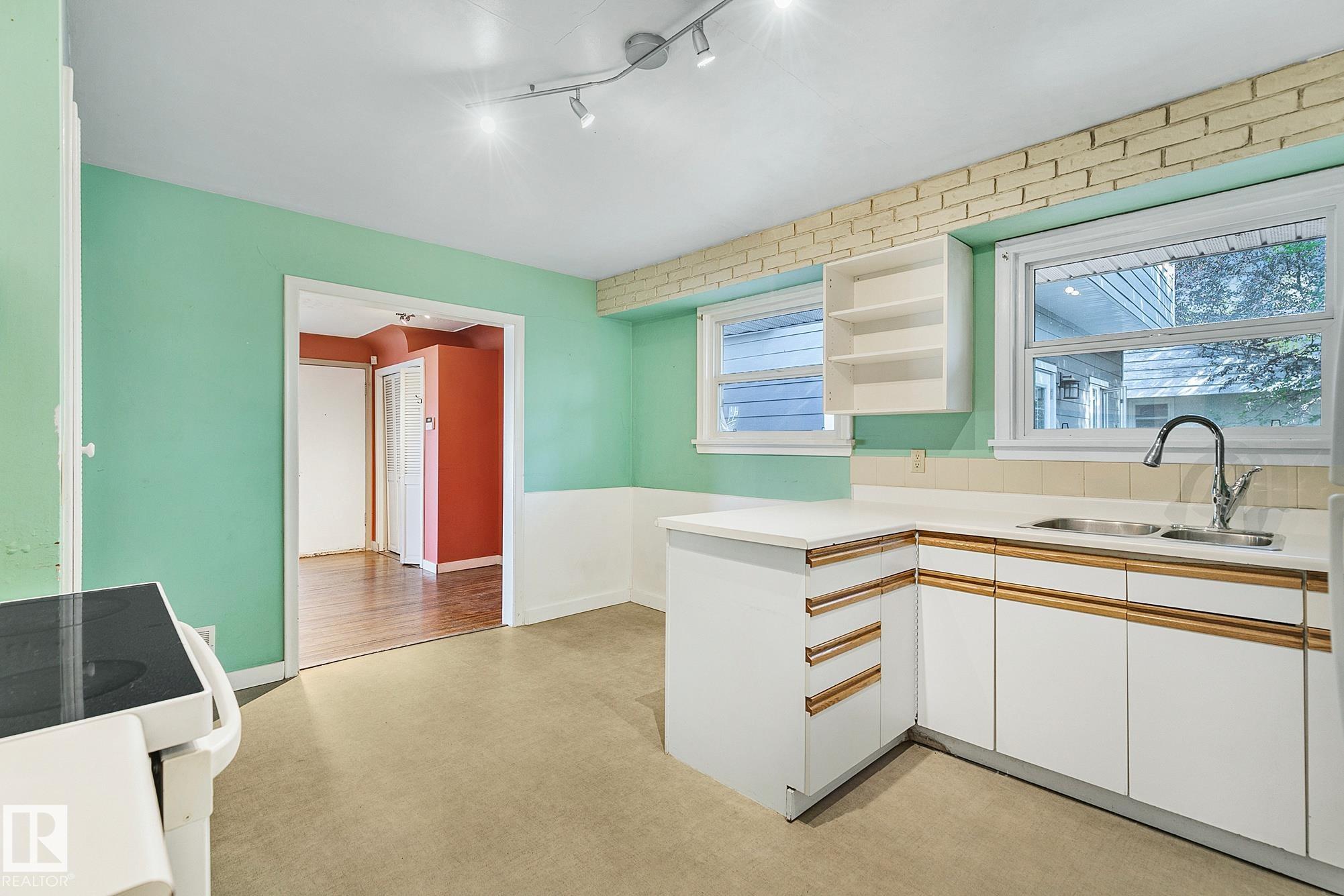 Photo 7 at 13915 102 Avenue NW, Glenora, Edmonton