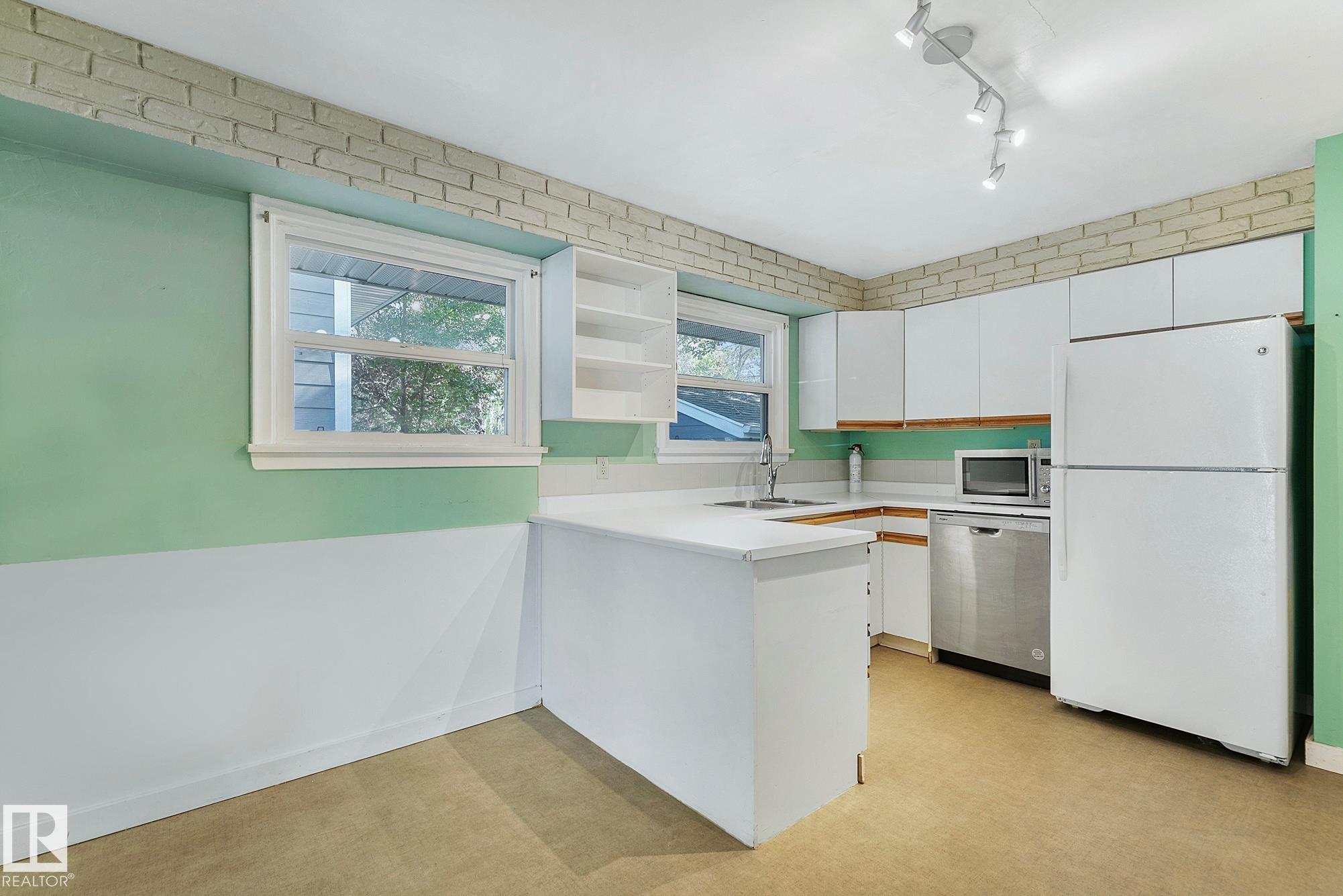 Photo 10 at 13915 102 Avenue NW, Glenora, Edmonton