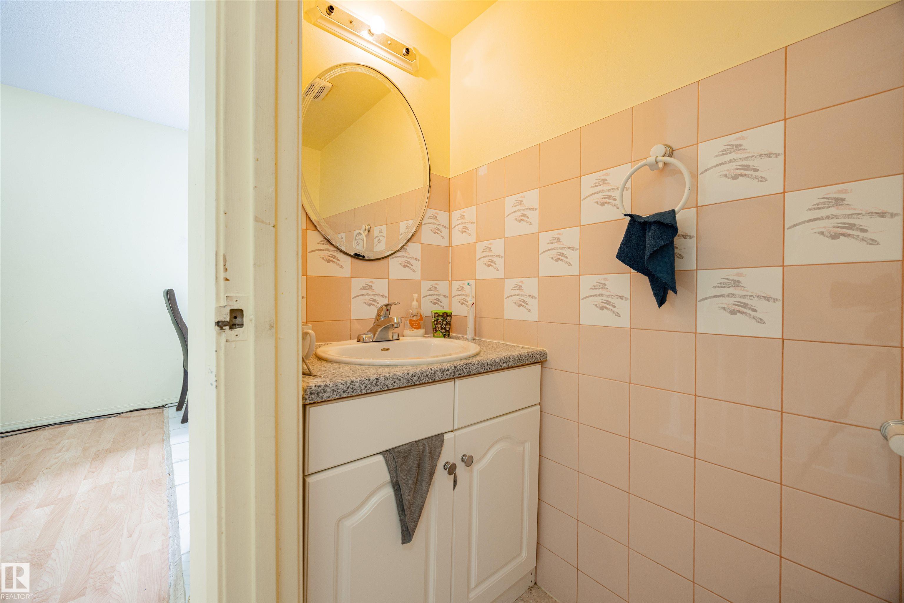 Photo 9 at 774 Abbottsfield Road NW, Abbottsfield, Edmonton