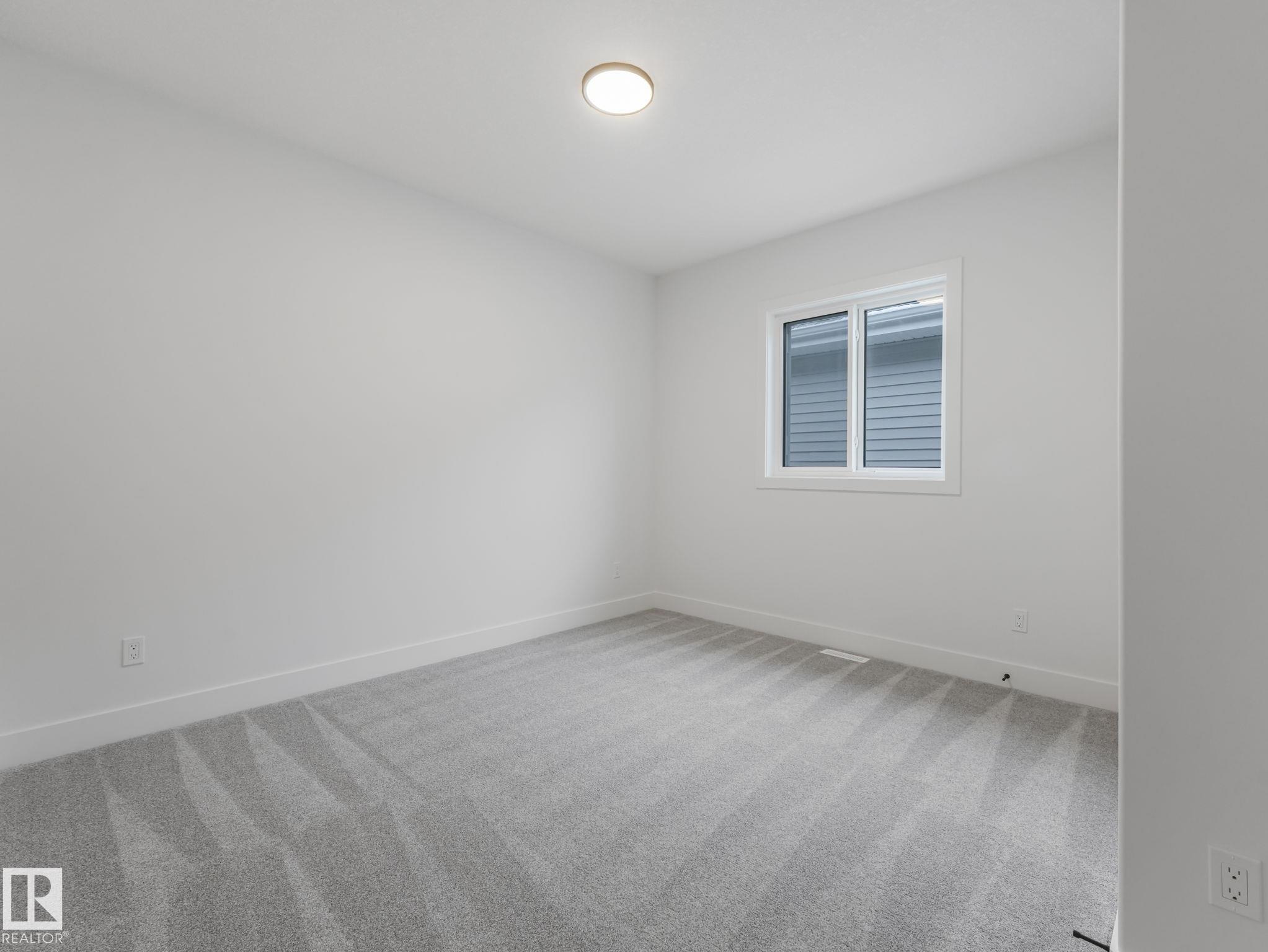 Photo 23 at 75 Meadowgrove Lane, McLaughlin, Spruce Grove