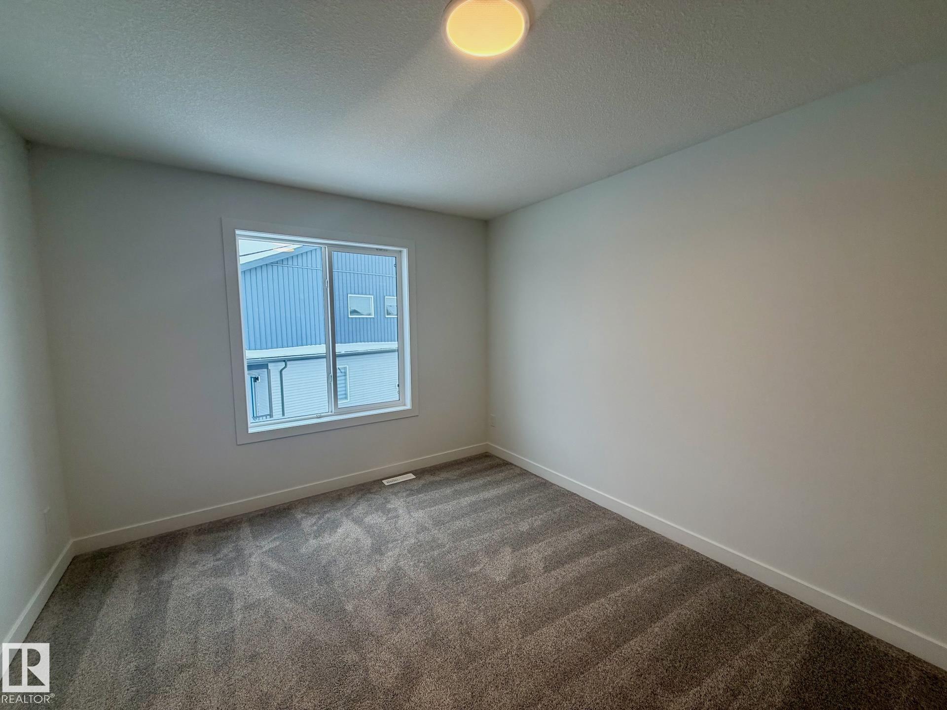 Photo 11 at 2 - 710 Mattson Drive SW, Mattson, Edmonton