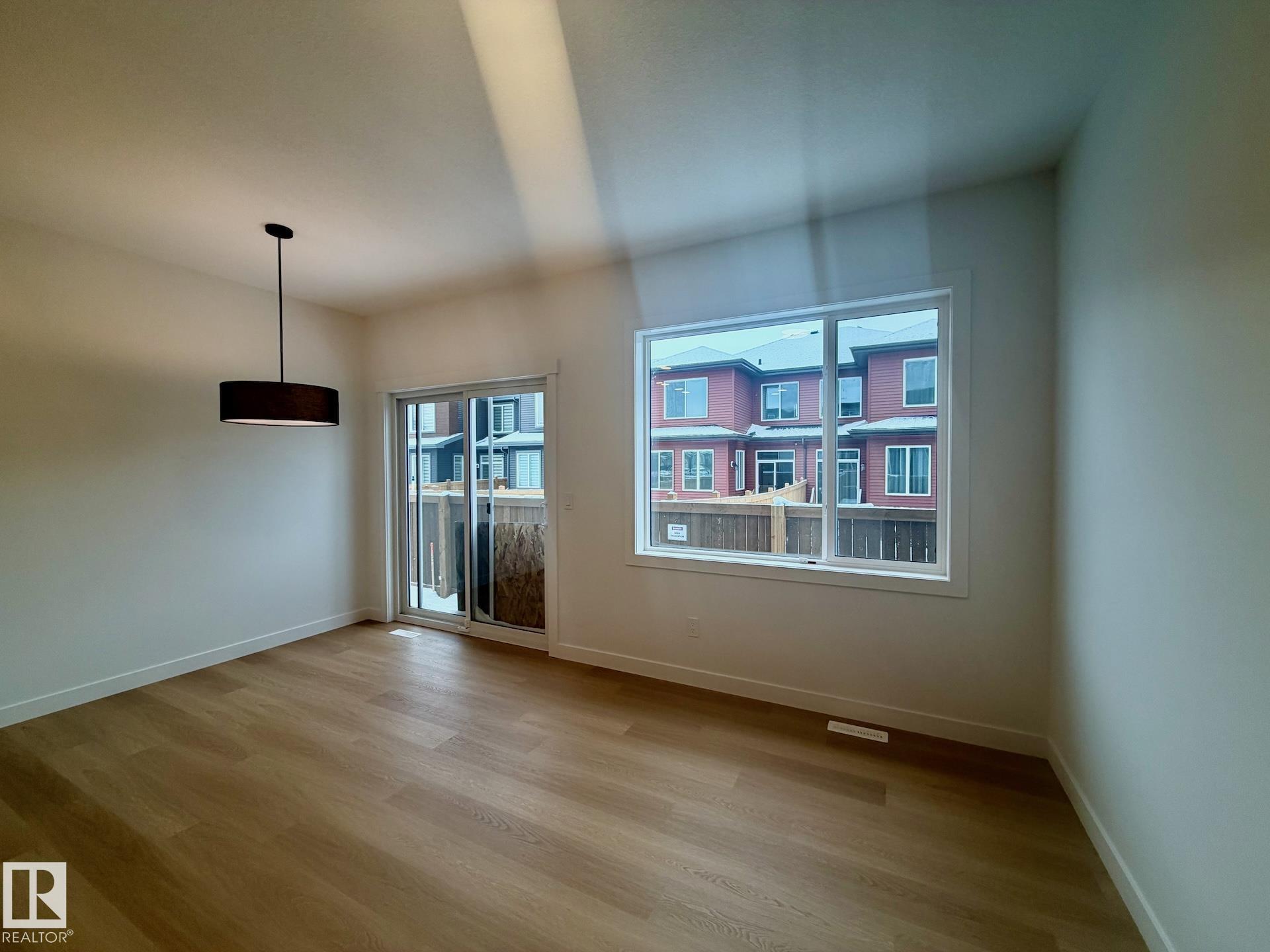 Photo 3 at 2 - 710 Mattson Drive SW, Mattson, Edmonton