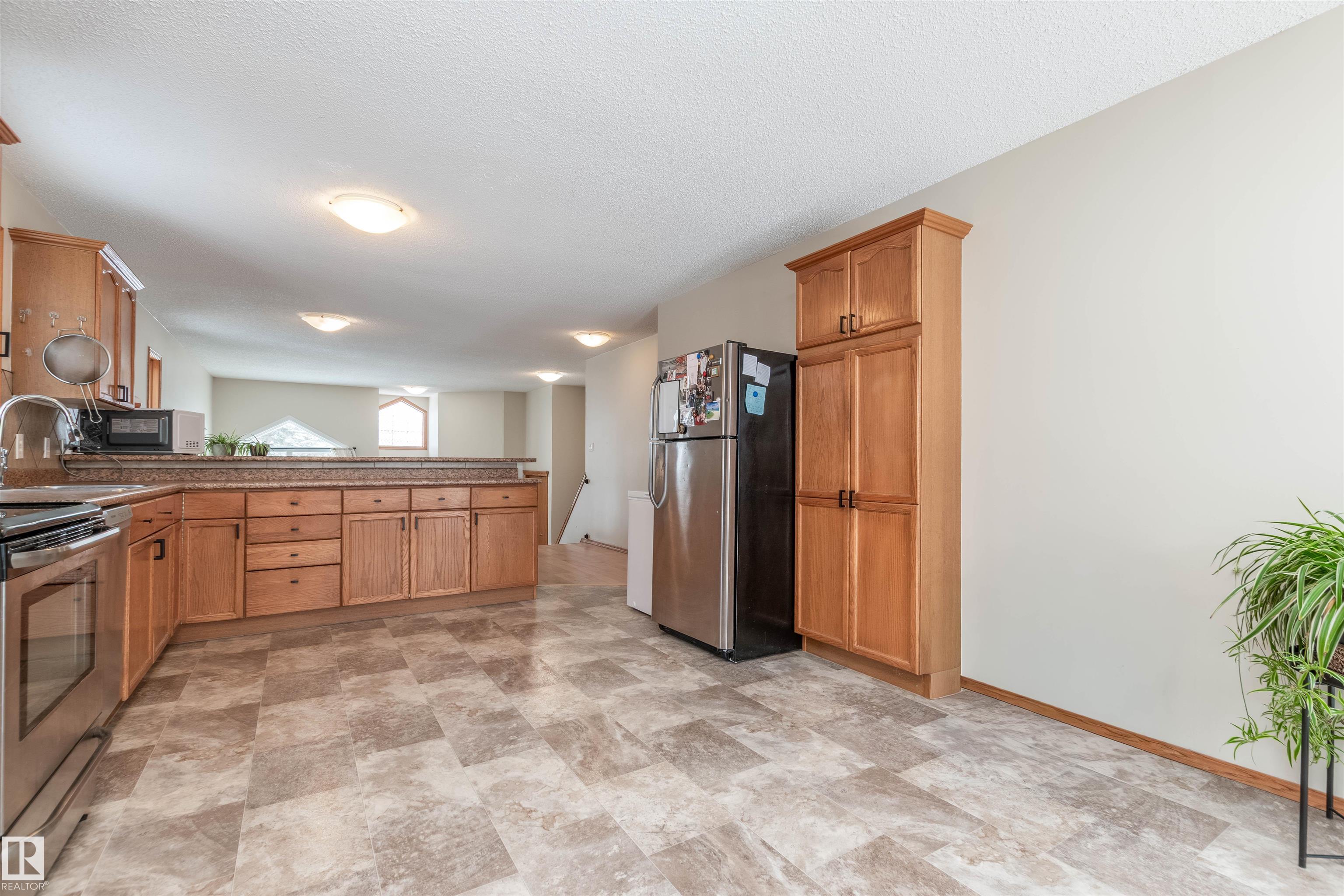 Photo 11 at 221 Grandin Drive, Morinville