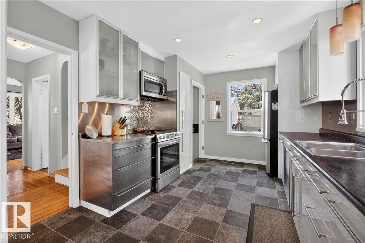 Photo 16 at 11302 56 Street NW, Highlands, Edmonton