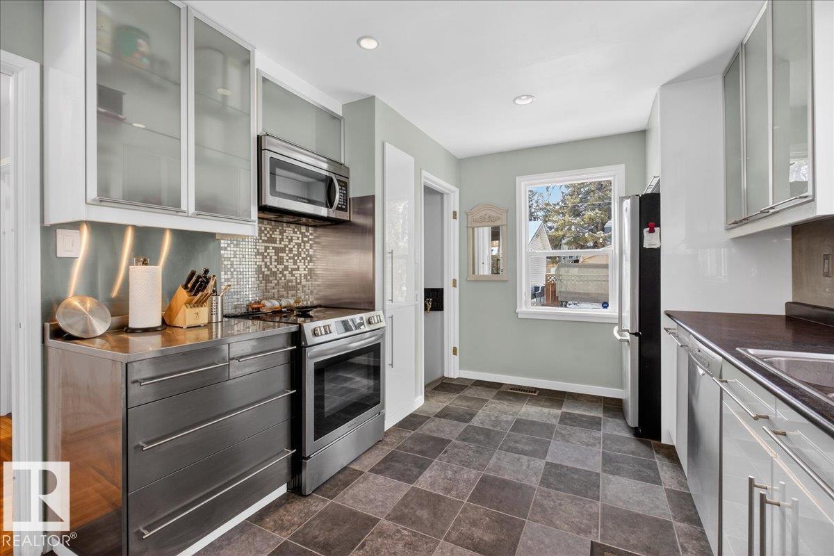 Photo 17 at 11302 56 Street NW, Highlands, Edmonton