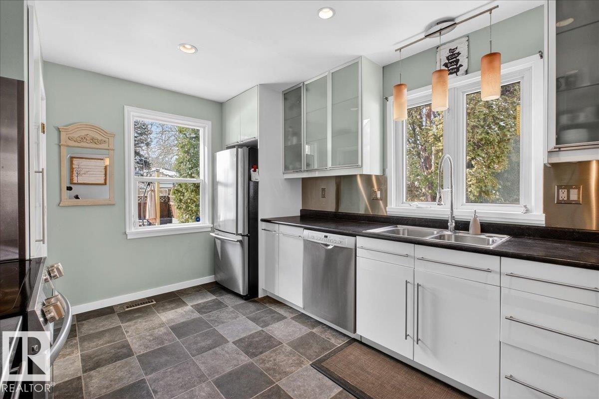 Photo 18 at 11302 56 Street NW, Highlands, Edmonton