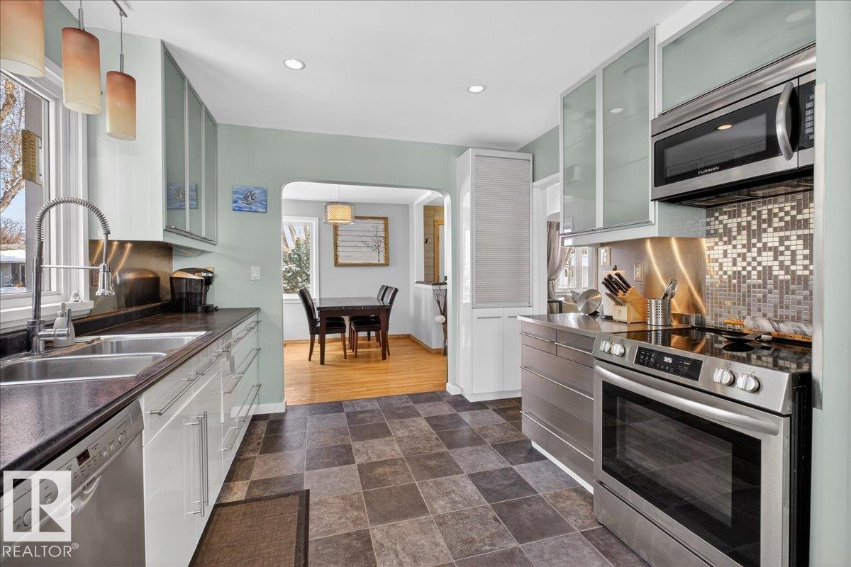 Photo 19 at 11302 56 Street NW, Highlands, Edmonton