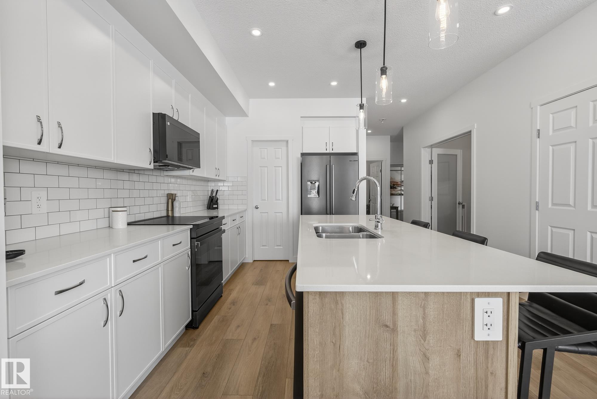 Photo 11 at 18 Nouveau Drive, North Ridge, St. Albert