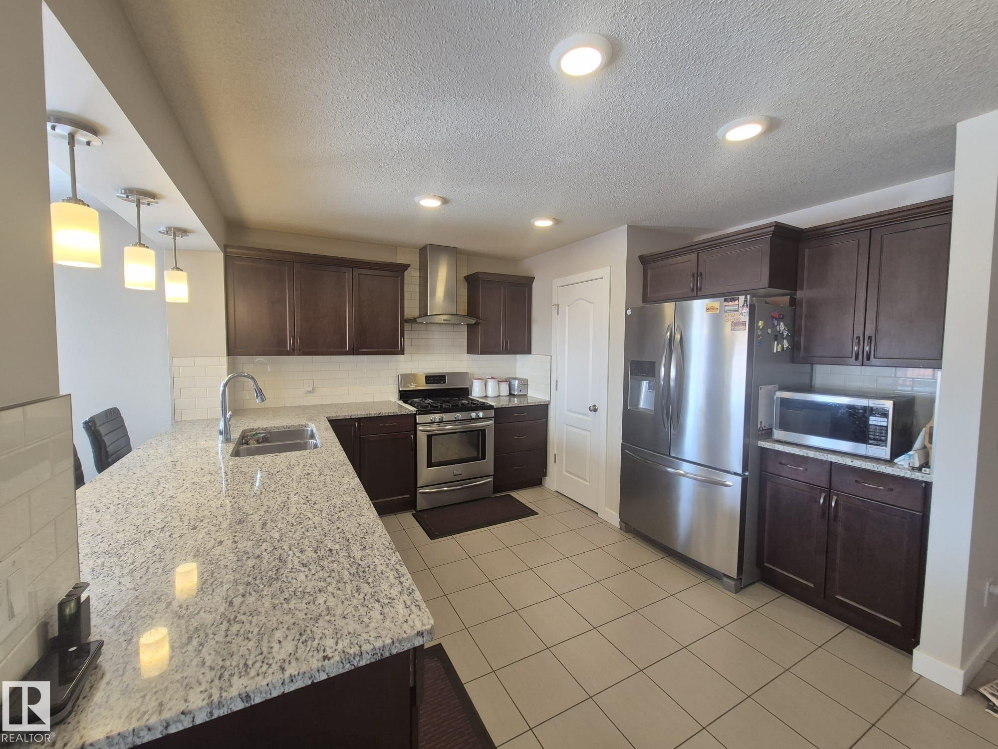 Photo 36 at 3308 18b Avenue NW, Laurel, Edmonton