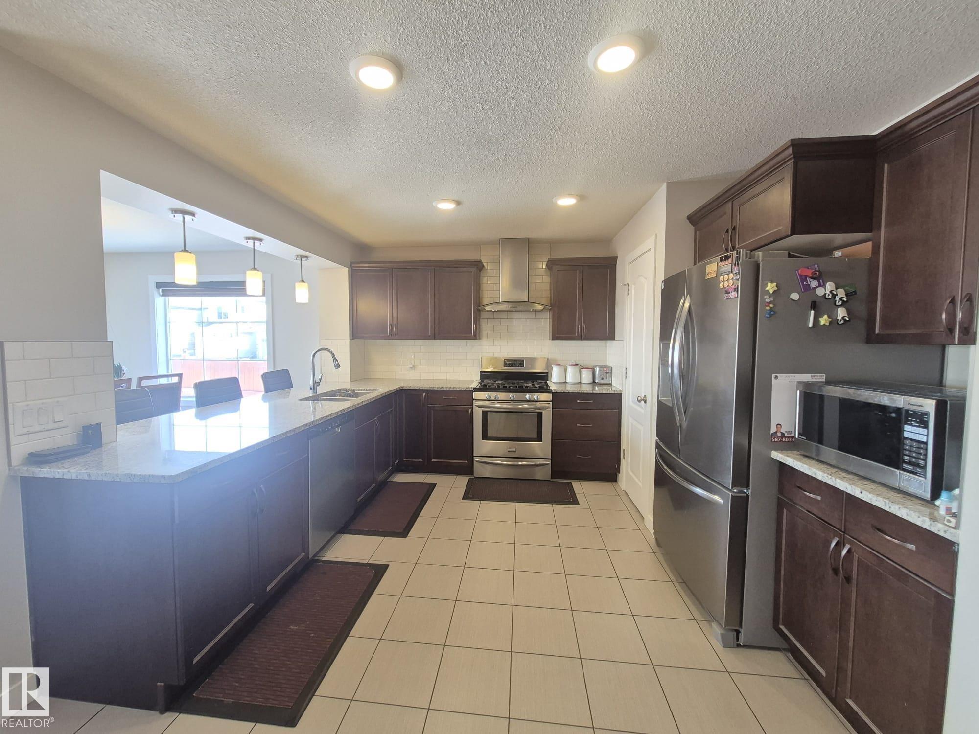 Photo 37 at 3308 18b Avenue NW, Laurel, Edmonton