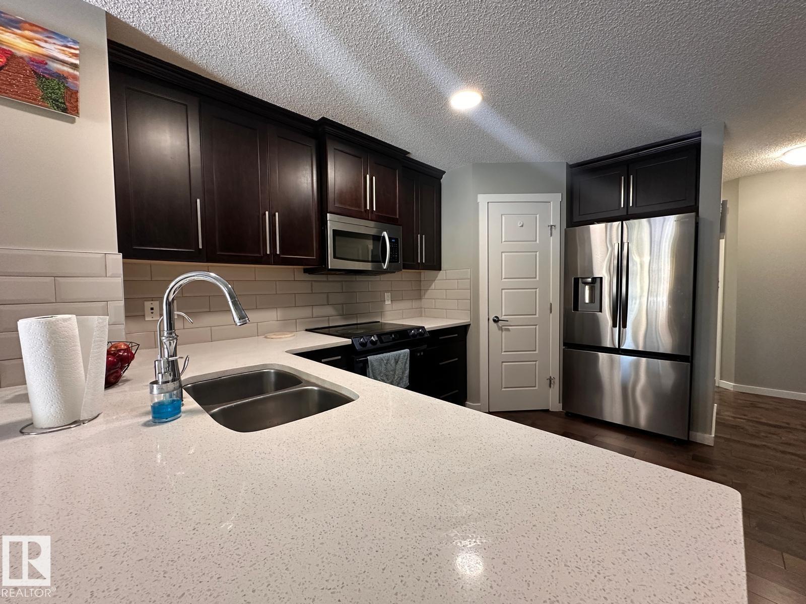 Photo 11 at 4427 6 Street NW, Maple Crest, Edmonton