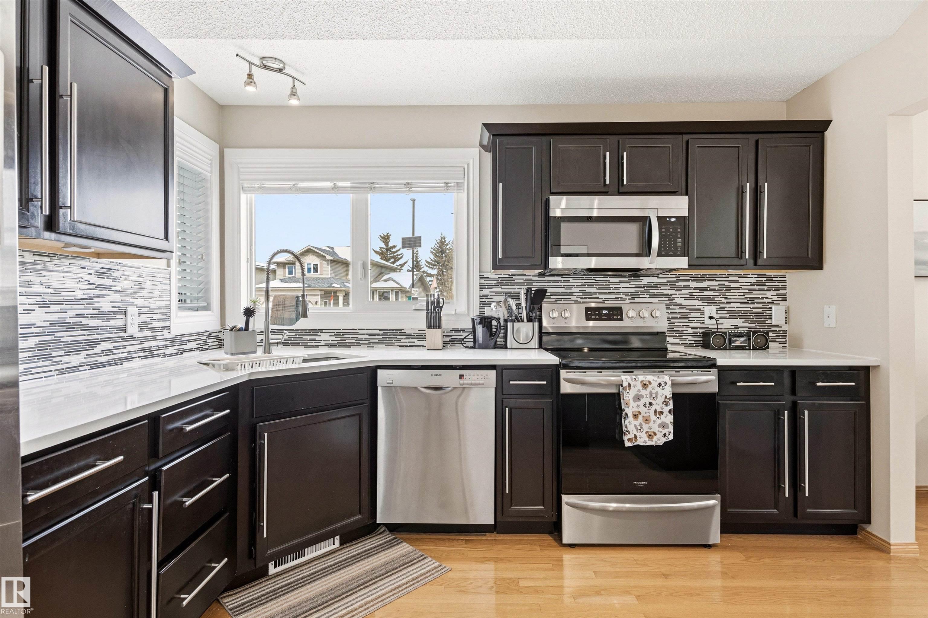 Photo 9 at 11231 12 Avenue NW, Twin Brooks, Edmonton