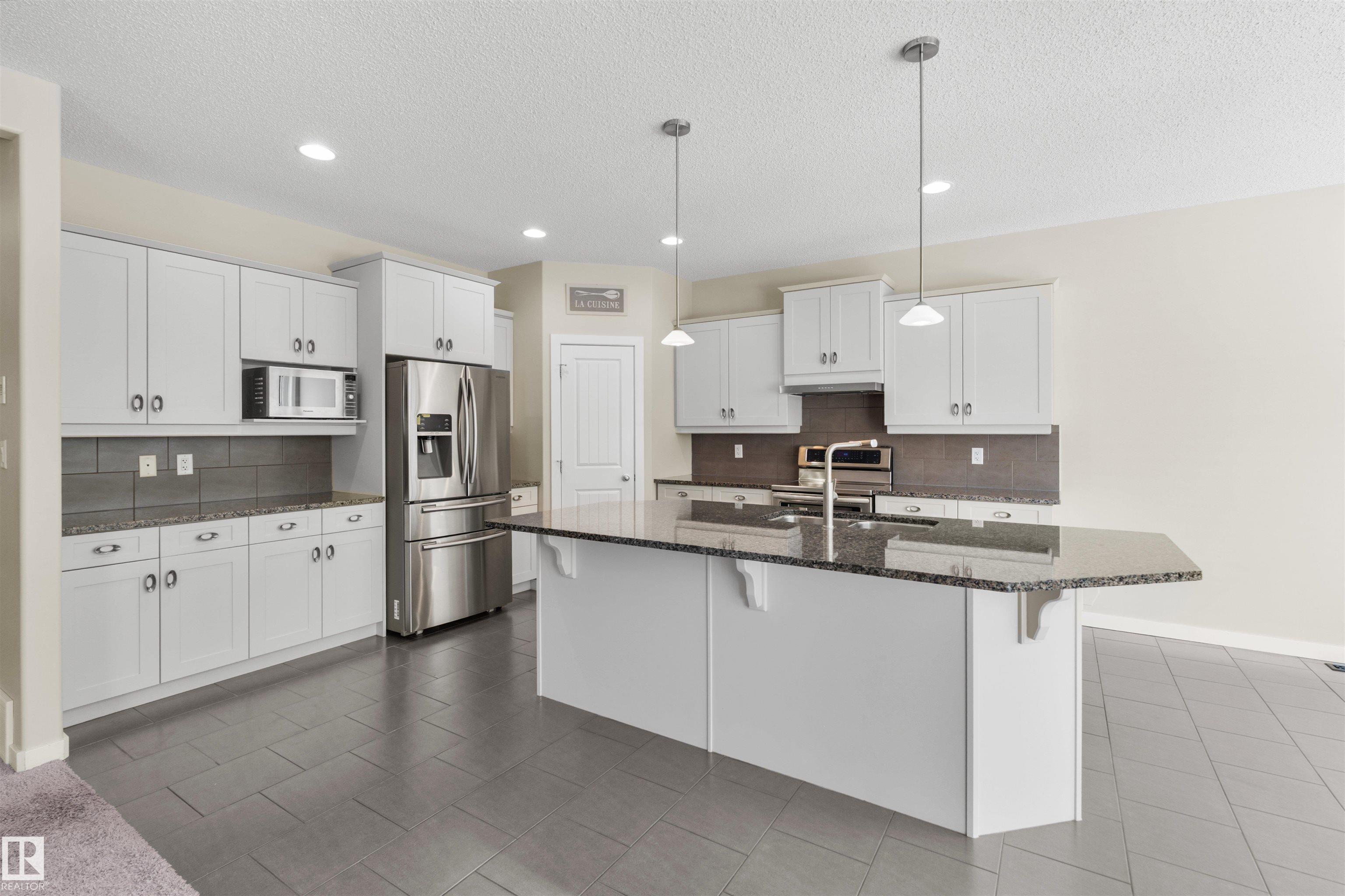 Photo 8 at 805 Armitage Wynd SW, Ambleside, Edmonton