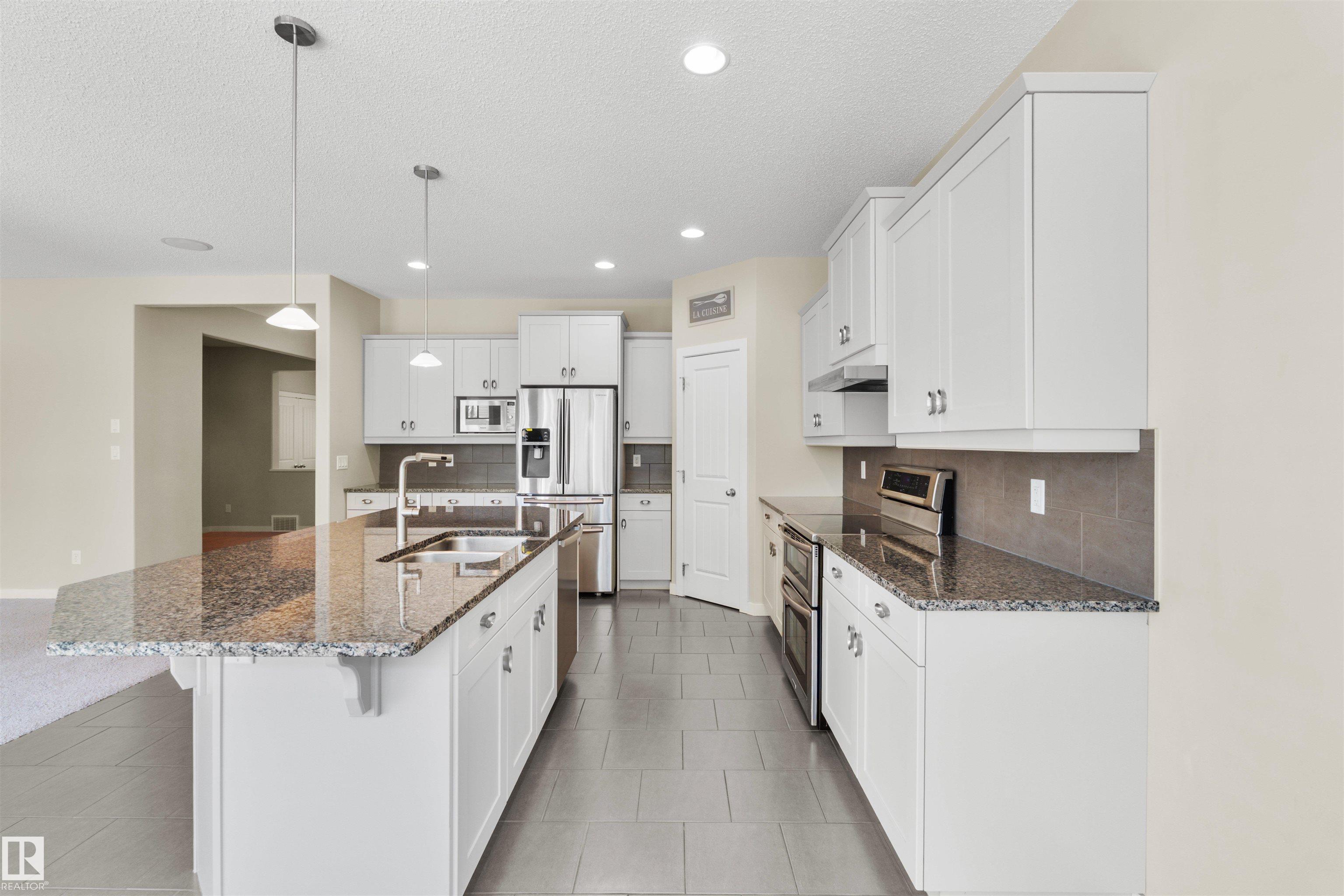 Photo 9 at 805 Armitage Wynd SW, Ambleside, Edmonton