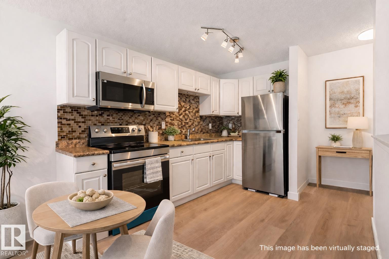 Photo 9 at 109 - 11429 124 Street NW, Inglewood, Edmonton