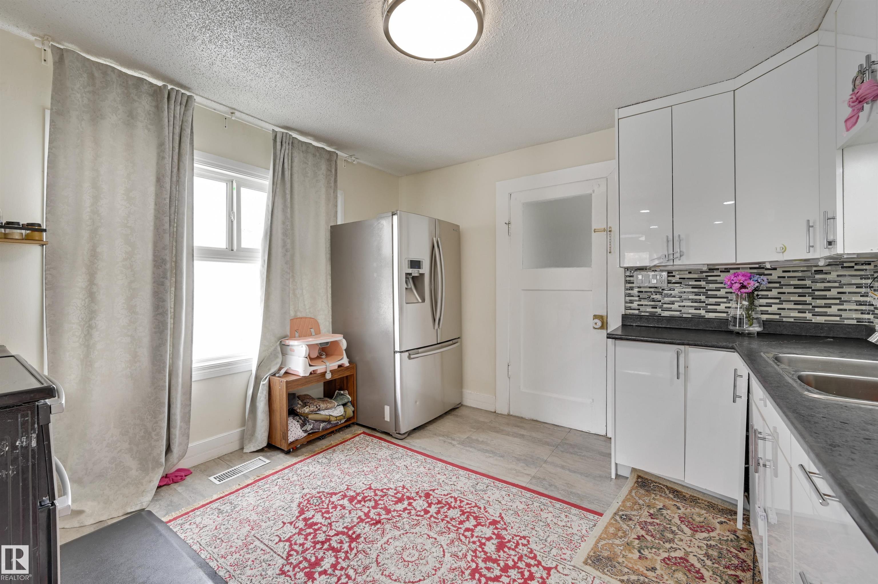 Photo 11 at 7449 83 Avenue NW, Kenilworth, Edmonton