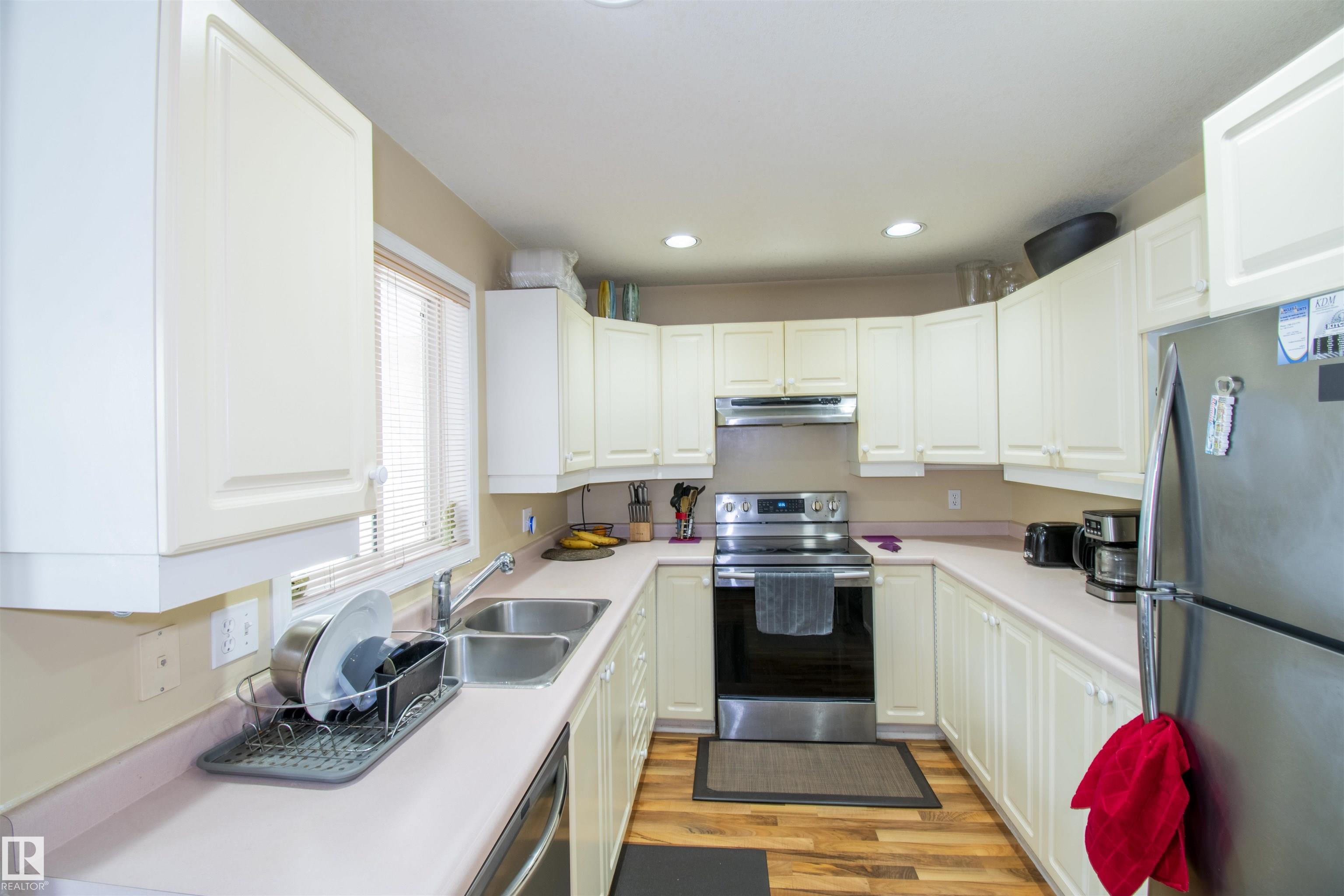 Photo 12 at 2 - 9703 174 Street NW, Terra Losa, Edmonton