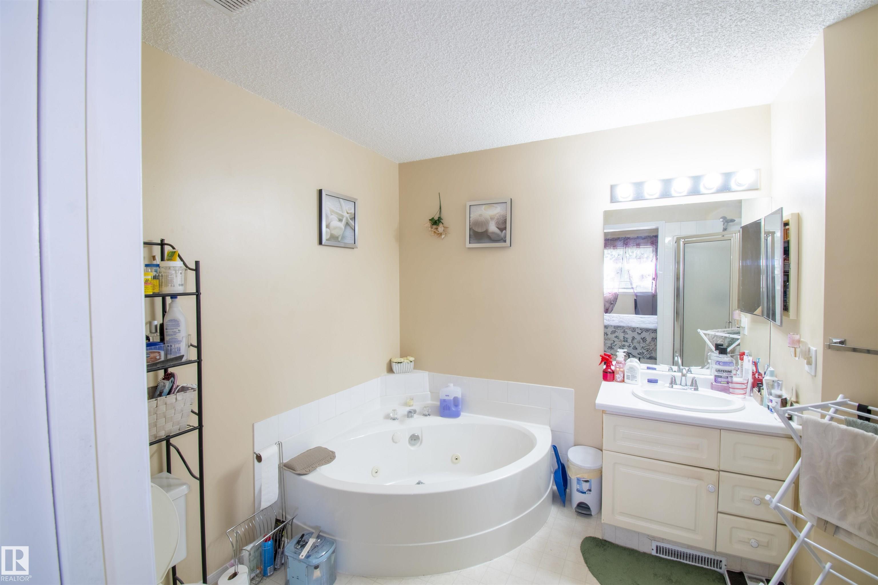 Photo 19 at 2 - 9703 174 Street NW, Terra Losa, Edmonton