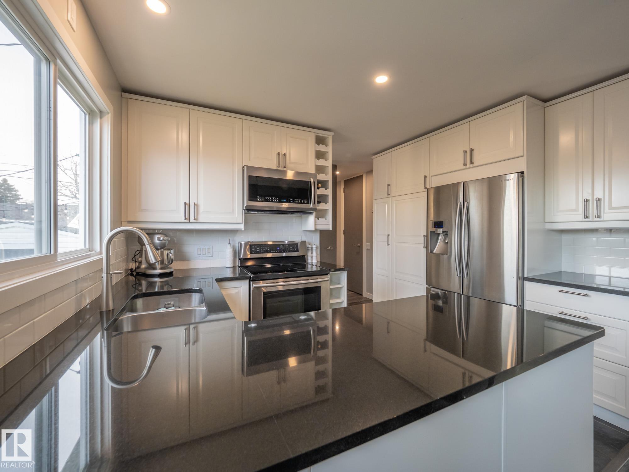 Photo 13 at 9319 Ottewell Road NW, Ottewell, Edmonton