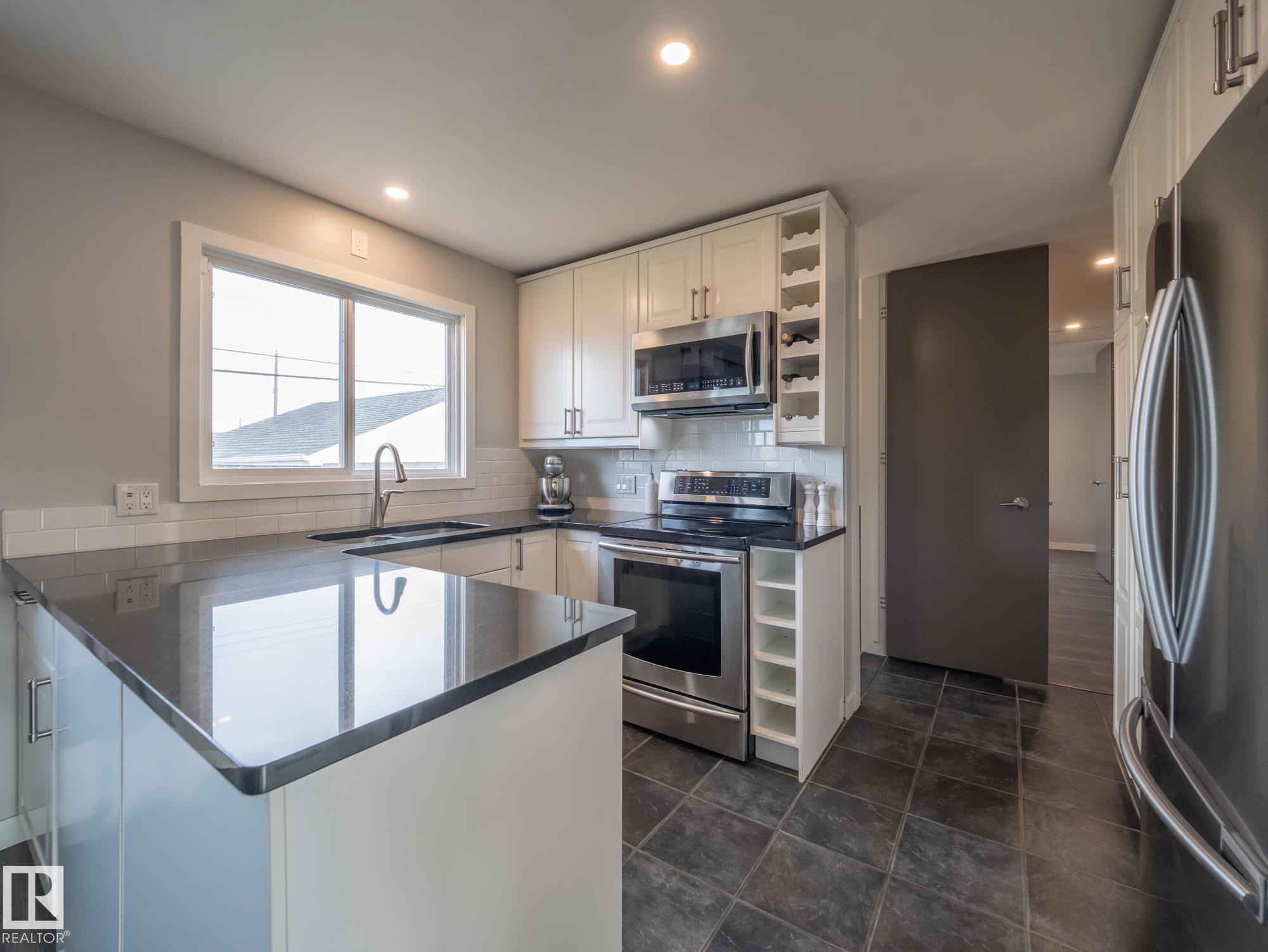 Photo 14 at 9319 Ottewell Road NW, Ottewell, Edmonton