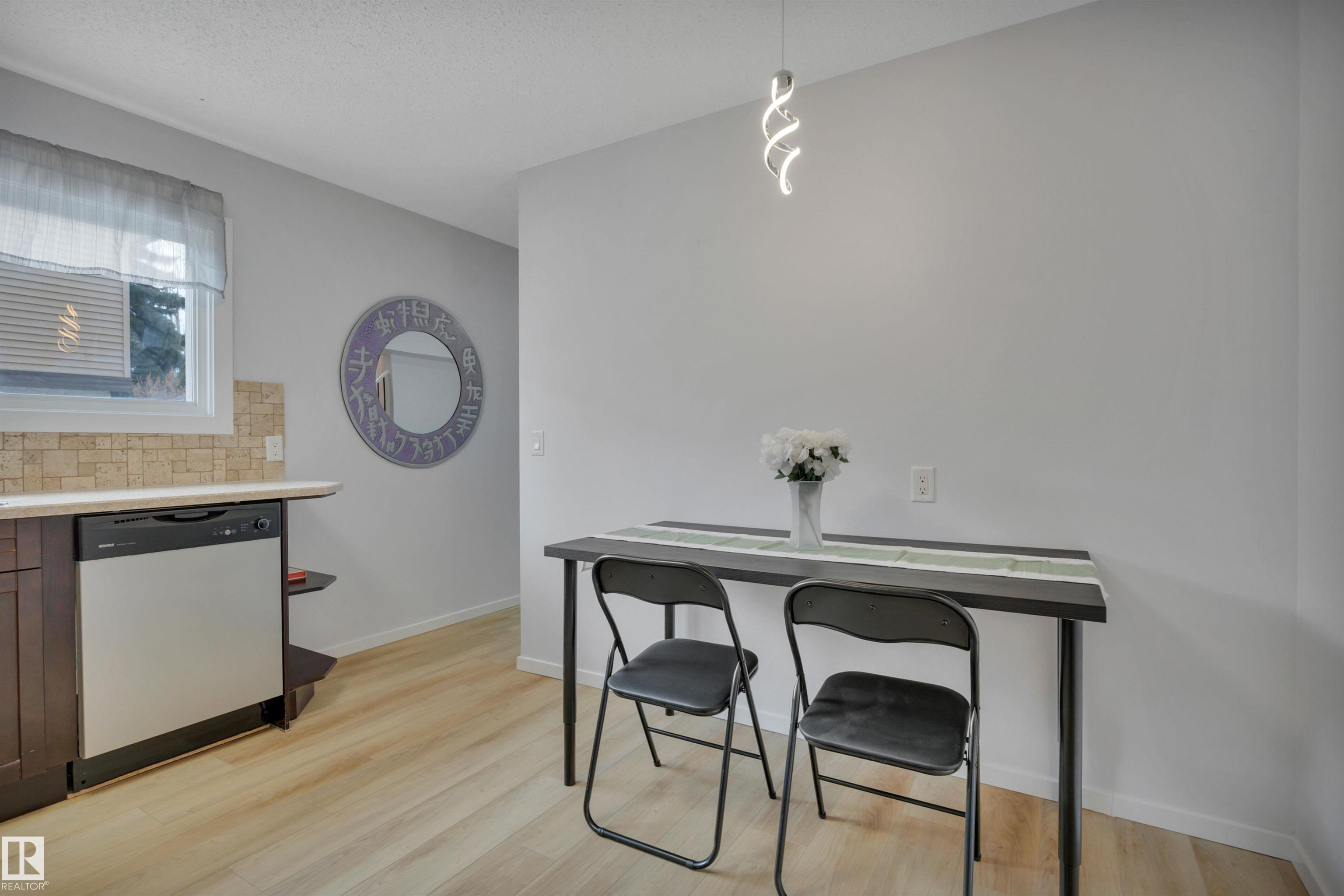 Photo 11 at 585 Knottwood Road W NW, Satoo, Edmonton