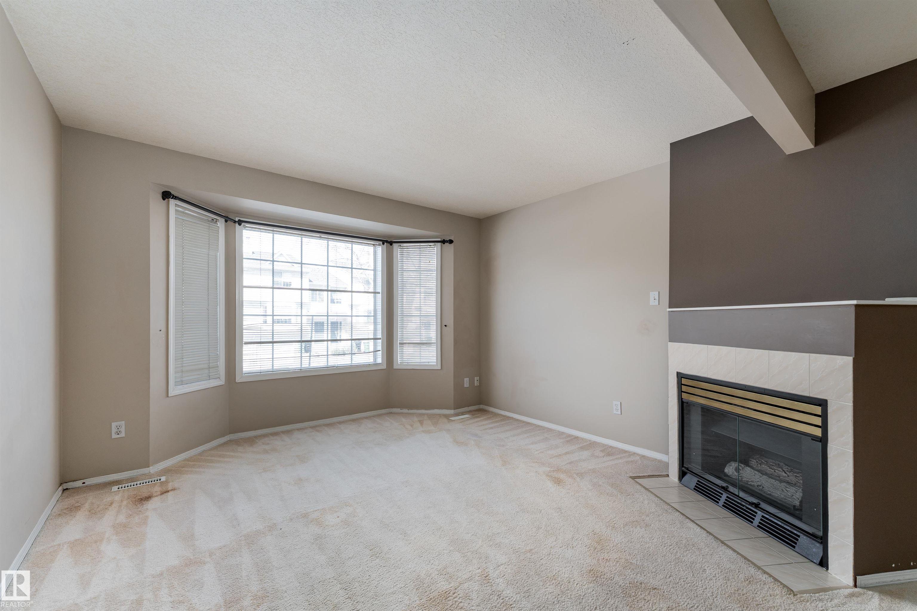 Photo 9 at 3 - 9703 174 Street NW, Terra Losa, Edmonton