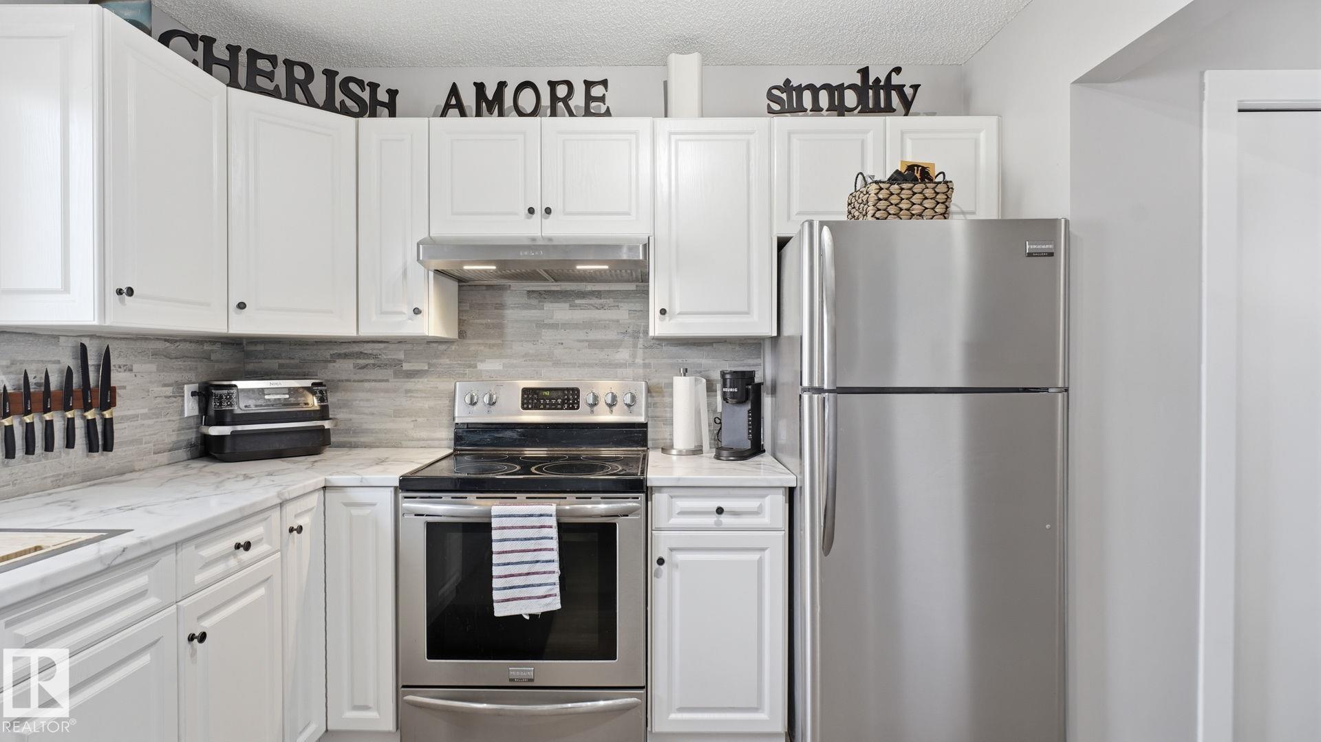 Photo 12 at 5 - 10 Ritchie Way, Regency Park, Sherwood Park