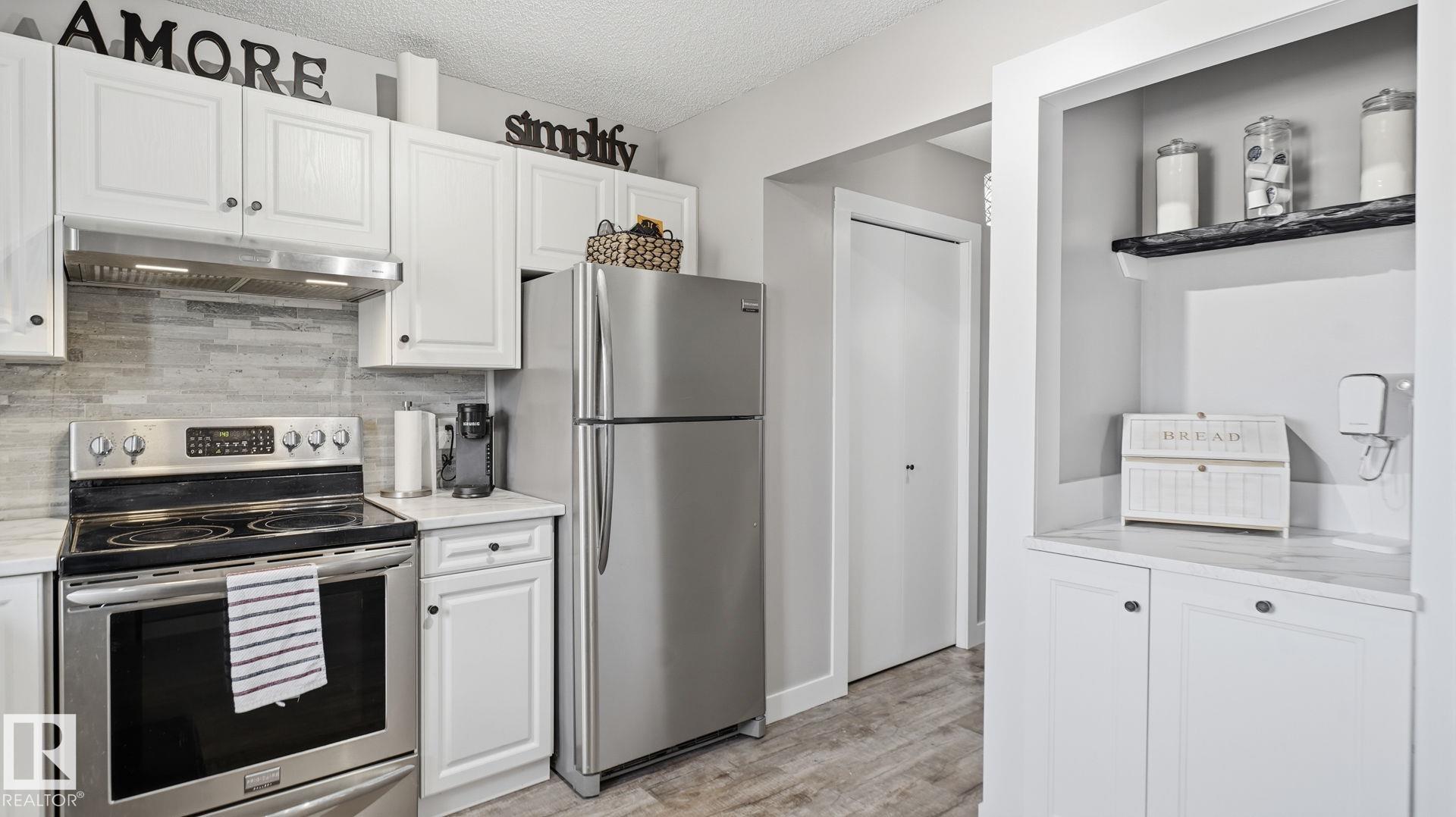 Photo 13 at 5 - 10 Ritchie Way, Regency Park, Sherwood Park