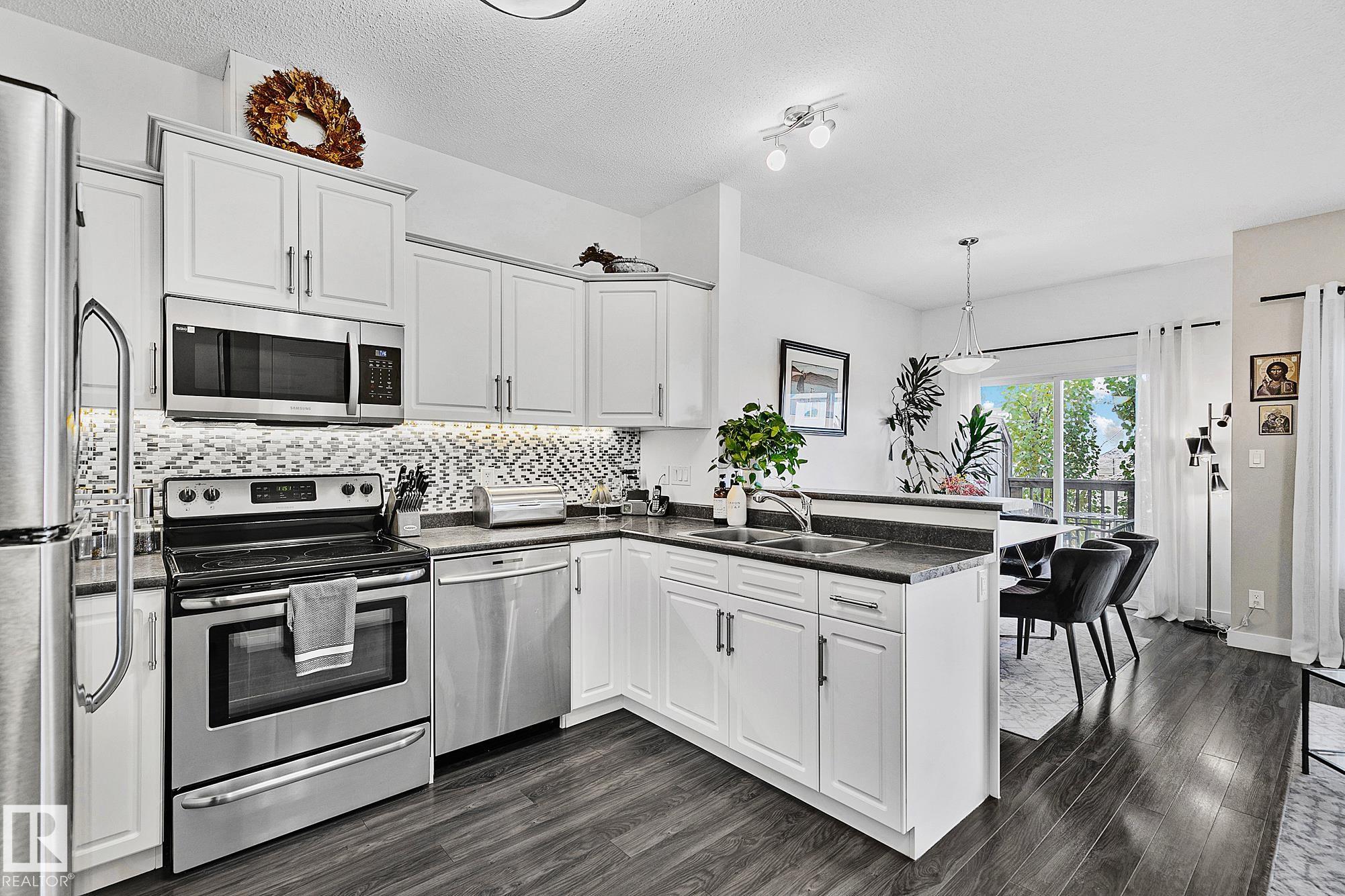 Photo 6 at 17 - 3103 Hilton Drive NW, The Hamptons, Edmonton