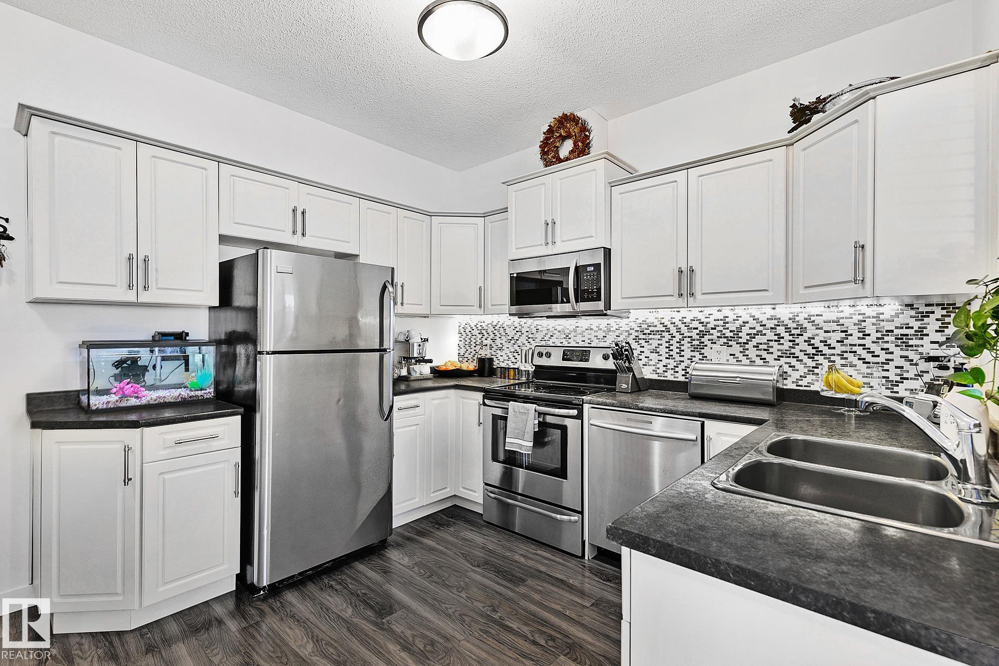 Photo 7 at 17 - 3103 Hilton Drive NW, The Hamptons, Edmonton