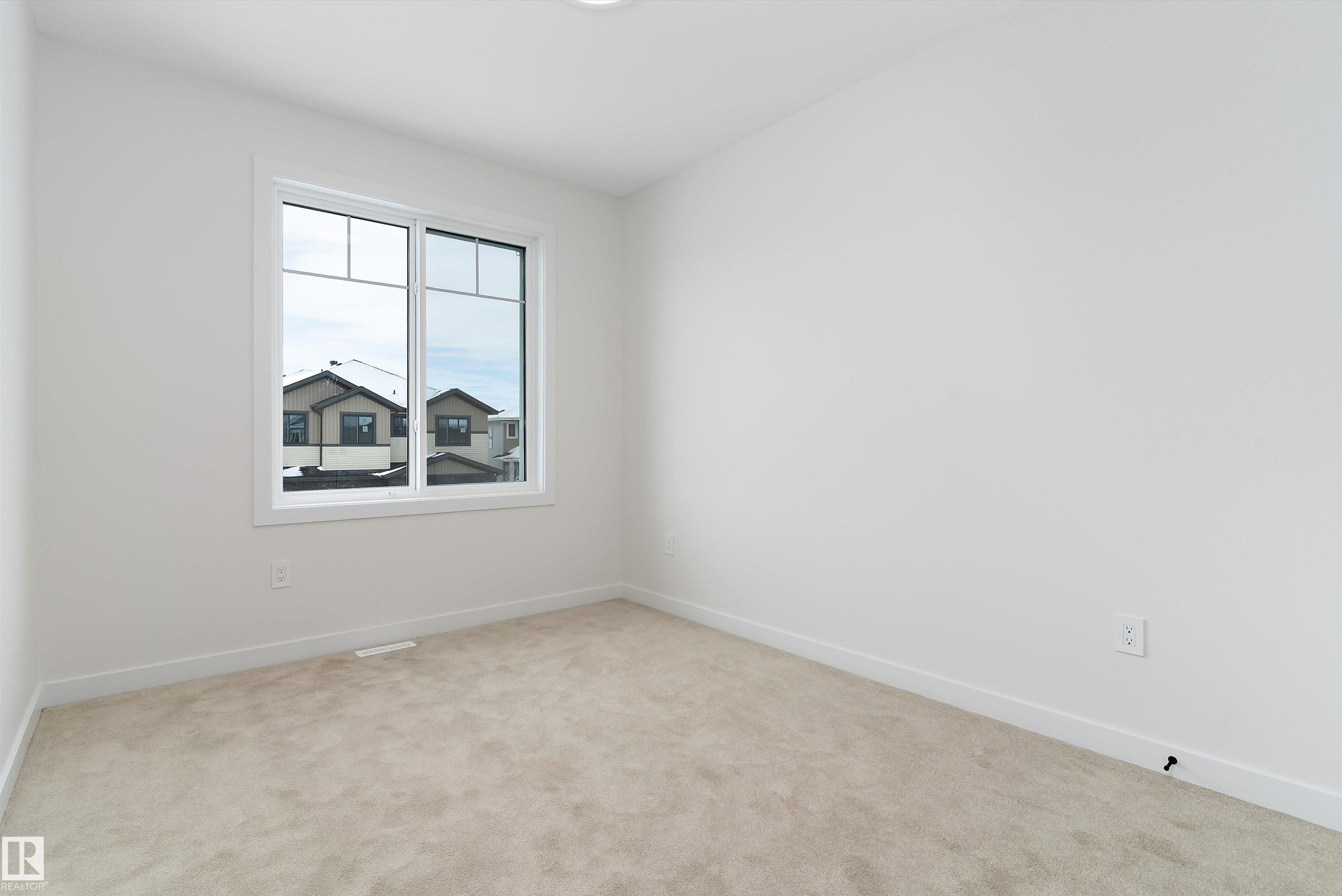 Photo 39 at 48 Meadowgrove Landing Crescent, McLaughlin, Spruce Grove