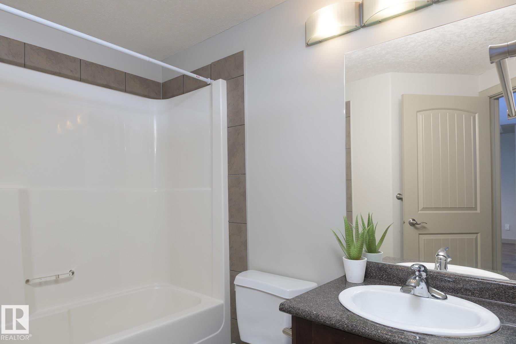 Photo 18 at 102 - 4415 48 Street, Alexandra Park, Leduc