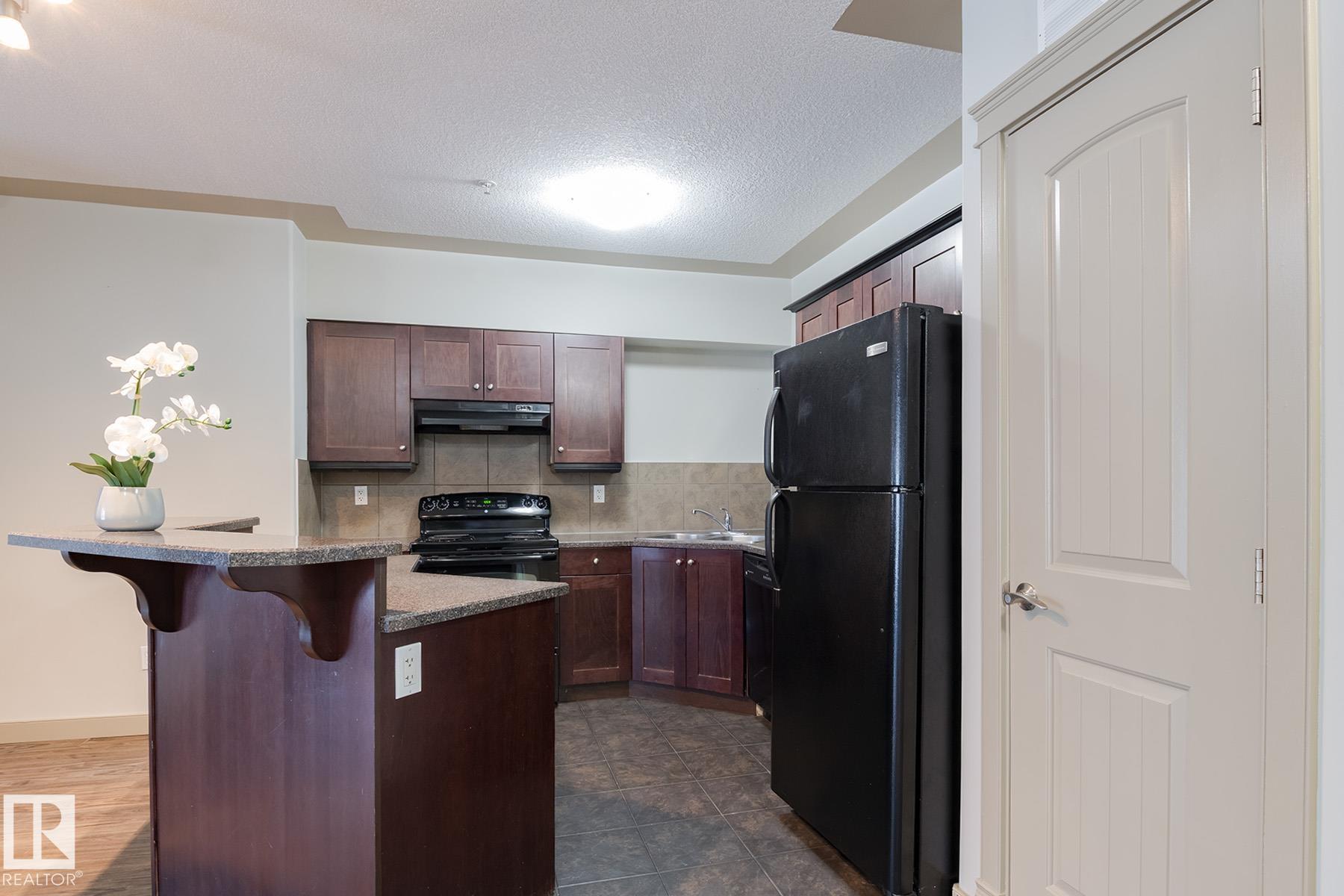 Photo 4 at 102 - 4415 48 Street, Alexandra Park, Leduc