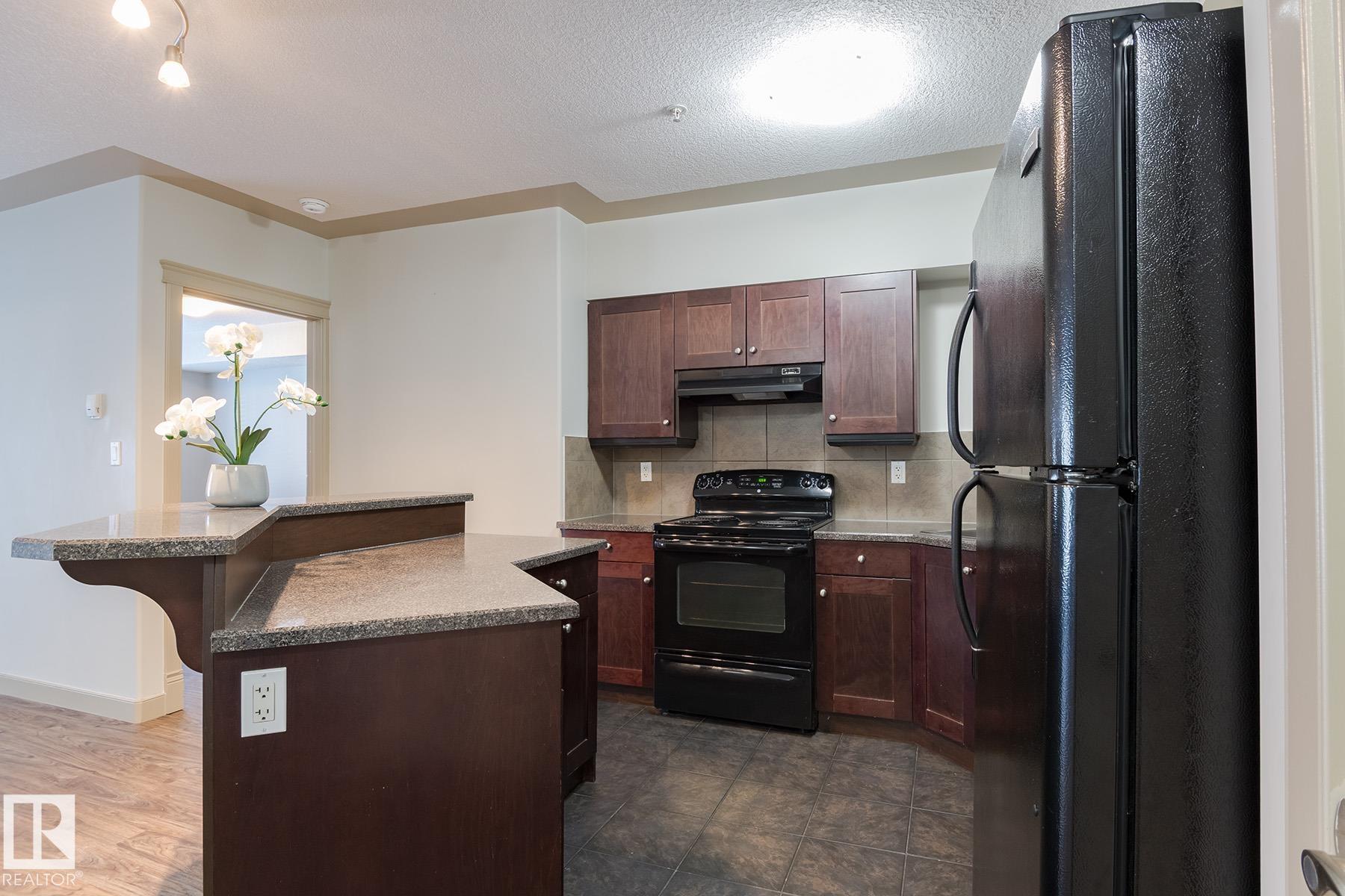 Photo 5 at 102 - 4415 48 Street, Alexandra Park, Leduc
