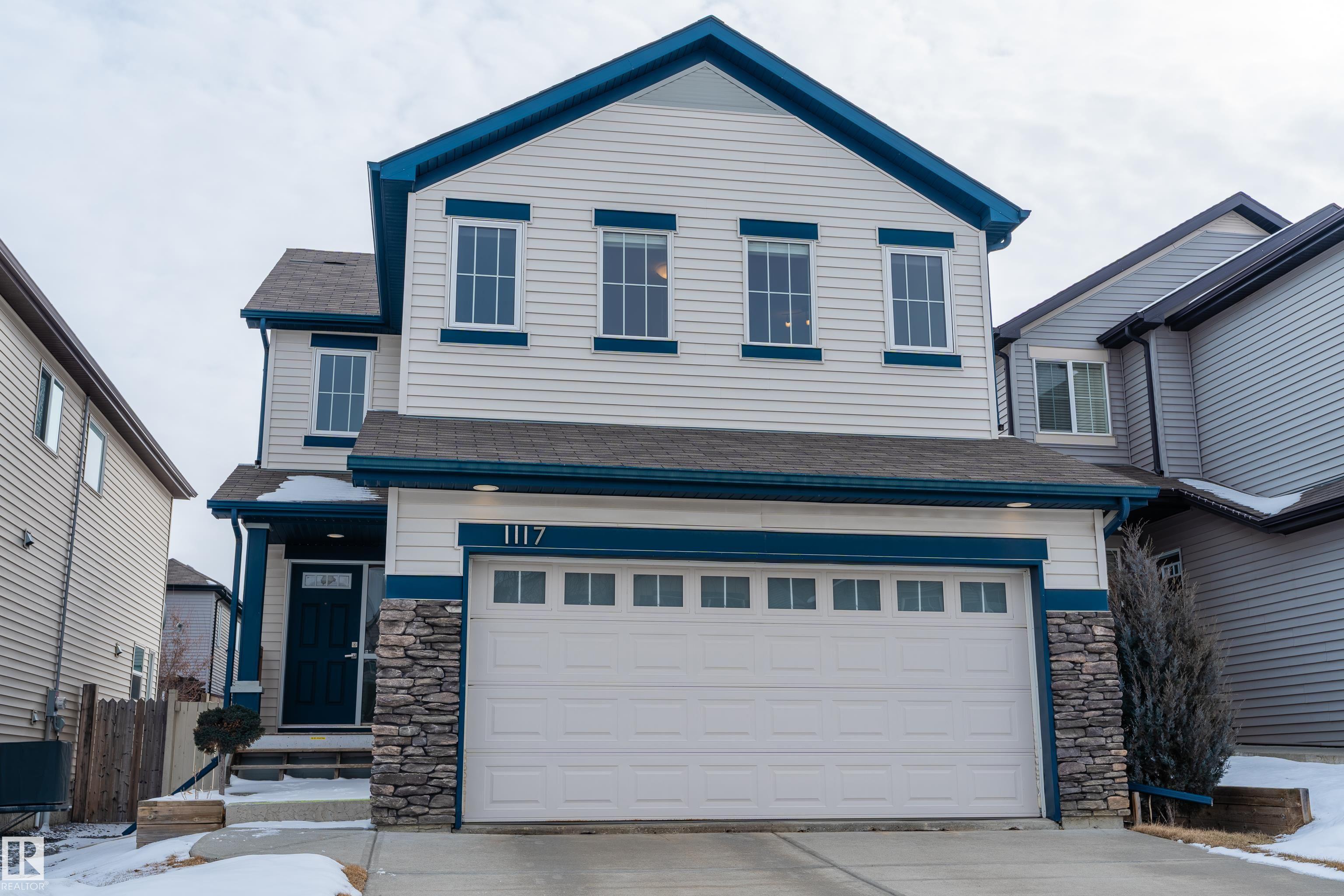 Welcome to the desirable community of Walker Lakes! This well-maintained 2-storey home offers over 1775 Sq Feet of bright, functional living space designed for family comfort. The main floor features an open-concept layout with a spacious living and dining area, a modern kitchen with ample cabinetry, a gas stove, and convenient main-floor laundry. Upstairs, a large bonus room with a cozy gas fireplace provides the perfect space for family movie nights or quiet relaxation. The primary suite includes a walk-in closet and a 4-piece ensuite, complemented by two additional bedrooms and another full bath. The unspoiled basement awaits your personal touch. Outside, enjoy a fully landscaped and fenced yard with a deck with gas hook up ideal for BBQs and summer gatherings. A double attached garage completes this inviting home. Located near schools, parks, public transit, shopping, and quick access to Ellerslie Road and Anthony Henday Drive, this is the perfect place to call home.