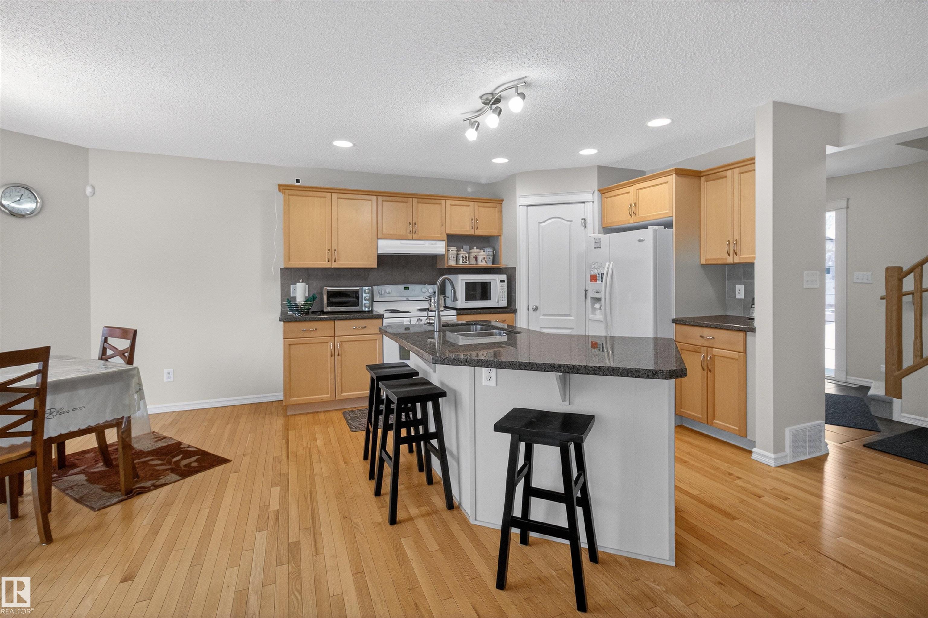 Photo 12 at 20707 56 Avenue NW, The Hamptons, Edmonton