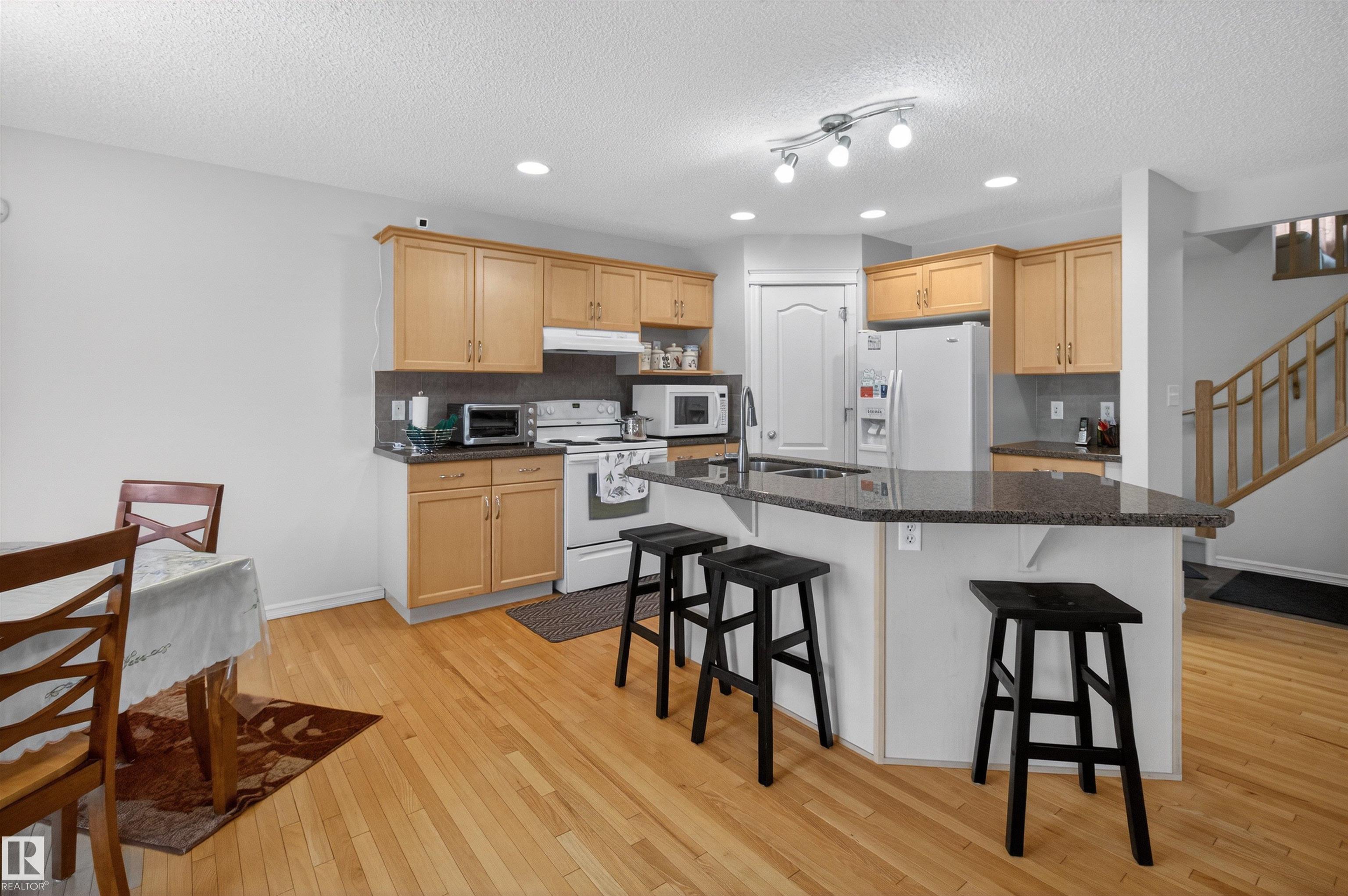 Photo 13 at 20707 56 Avenue NW, The Hamptons, Edmonton