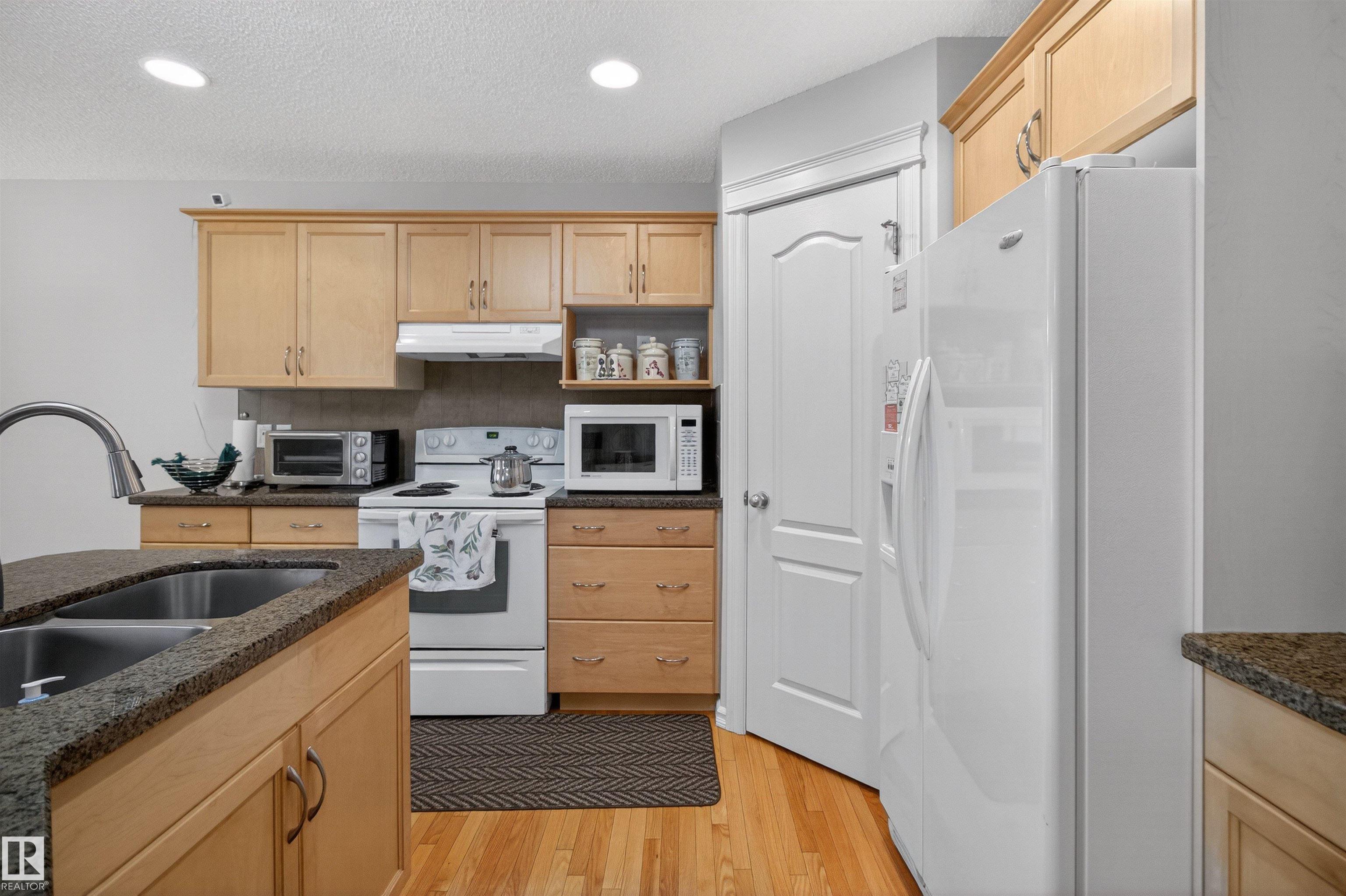 Photo 8 at 20707 56 Avenue NW, The Hamptons, Edmonton