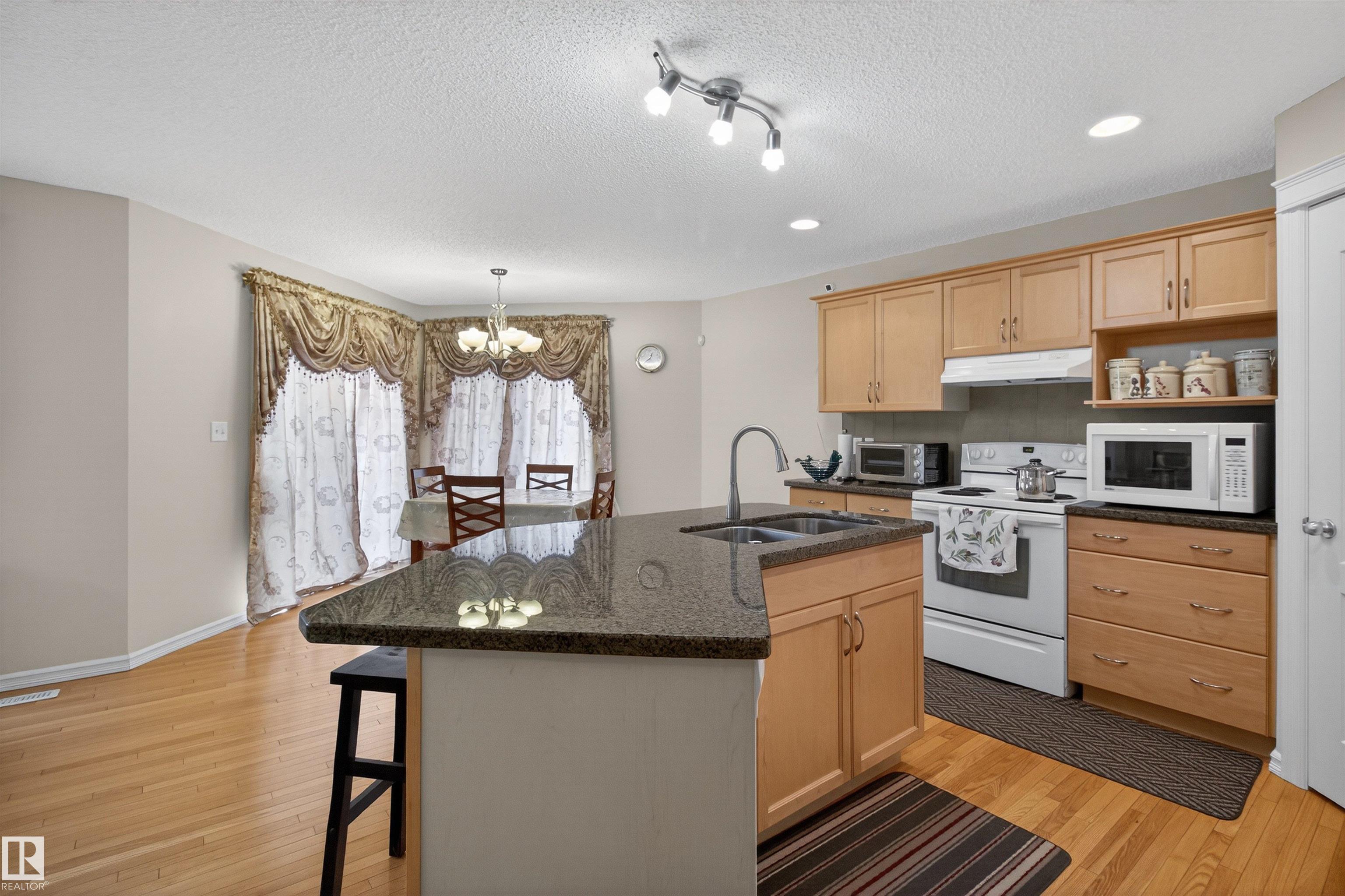 Photo 10 at 20707 56 Avenue NW, The Hamptons, Edmonton