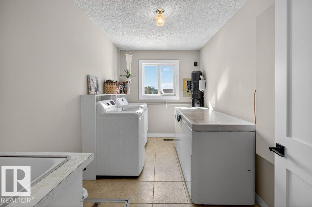 Photo 29 at 38 - 23211 Twp Road 520, Trevithick Park, Rural Strathcona County