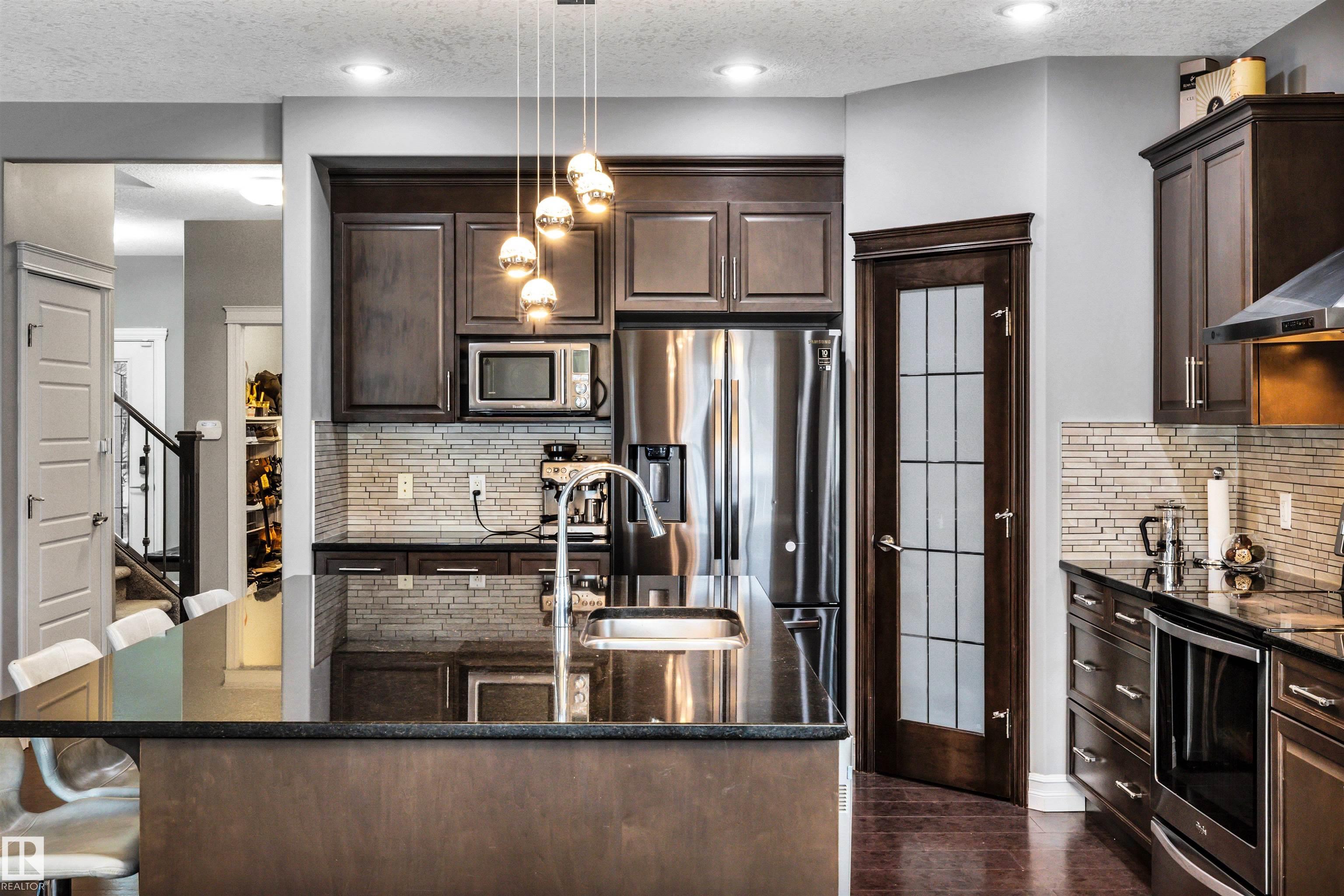 Photo 9 at 7728 18 Avenue SW, Summerside, Edmonton