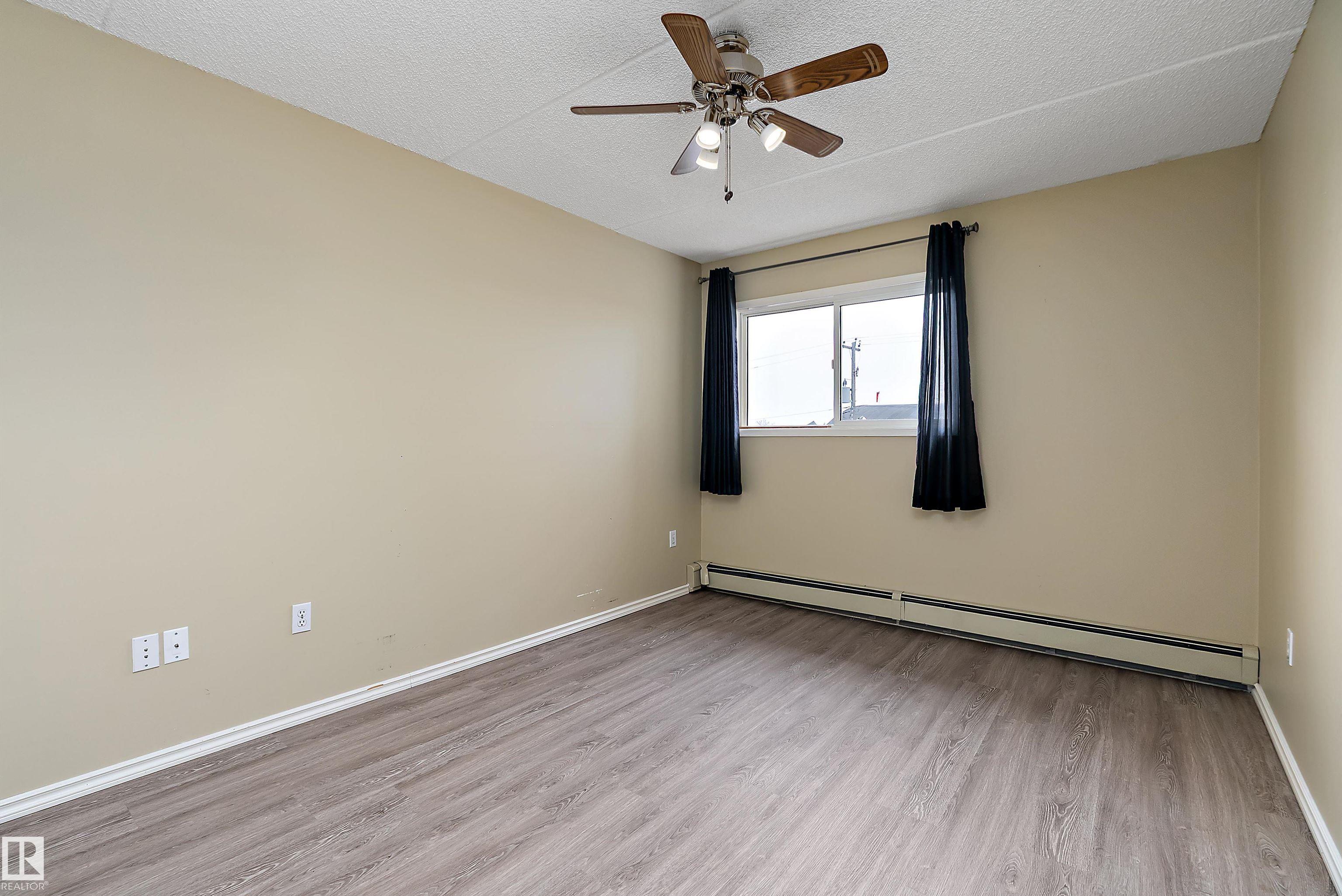 Photo 23 at 201 - 4906 47 Avenue, Central Business District, Leduc