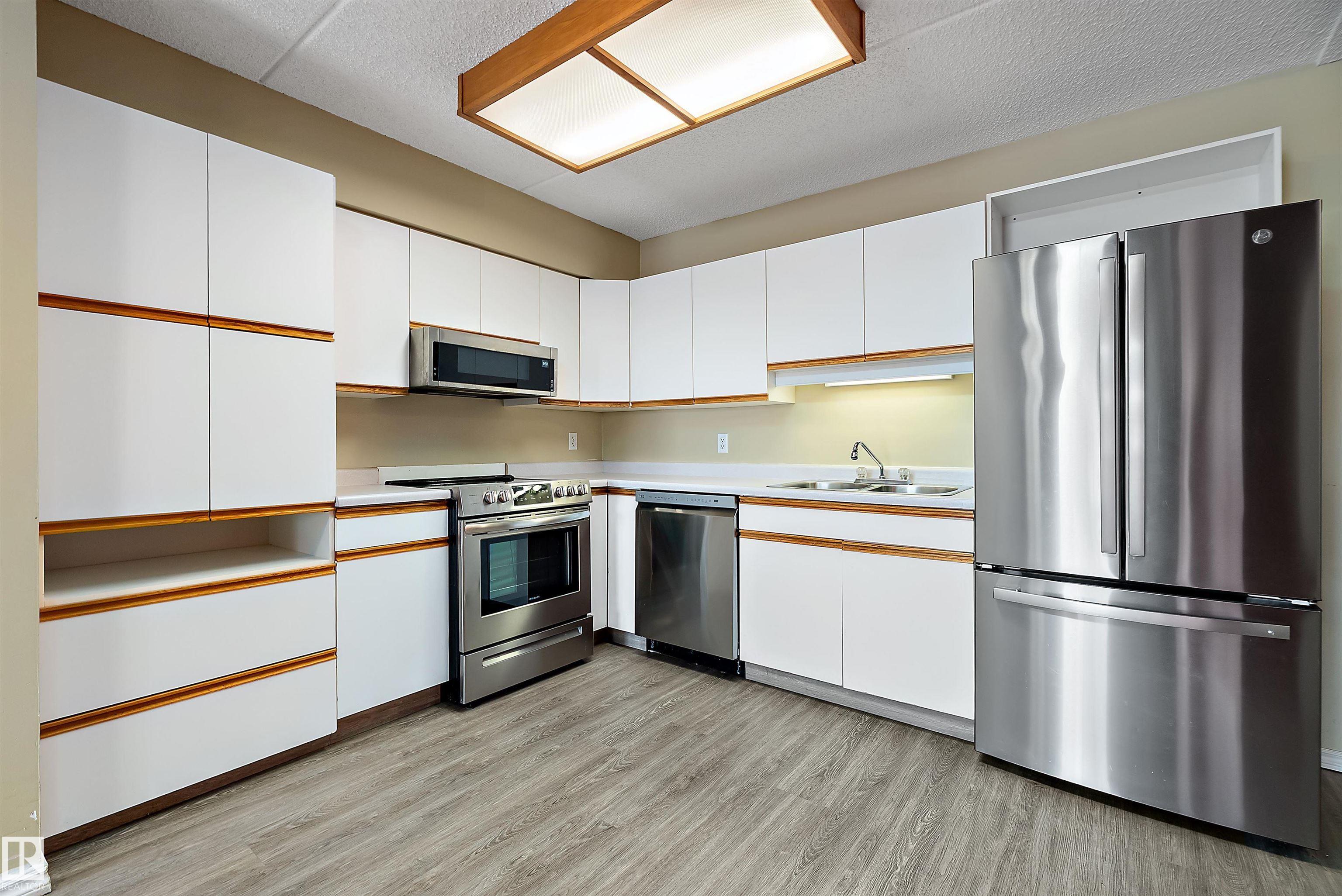 Photo 4 at 201 - 4906 47 Avenue, Central Business District, Leduc