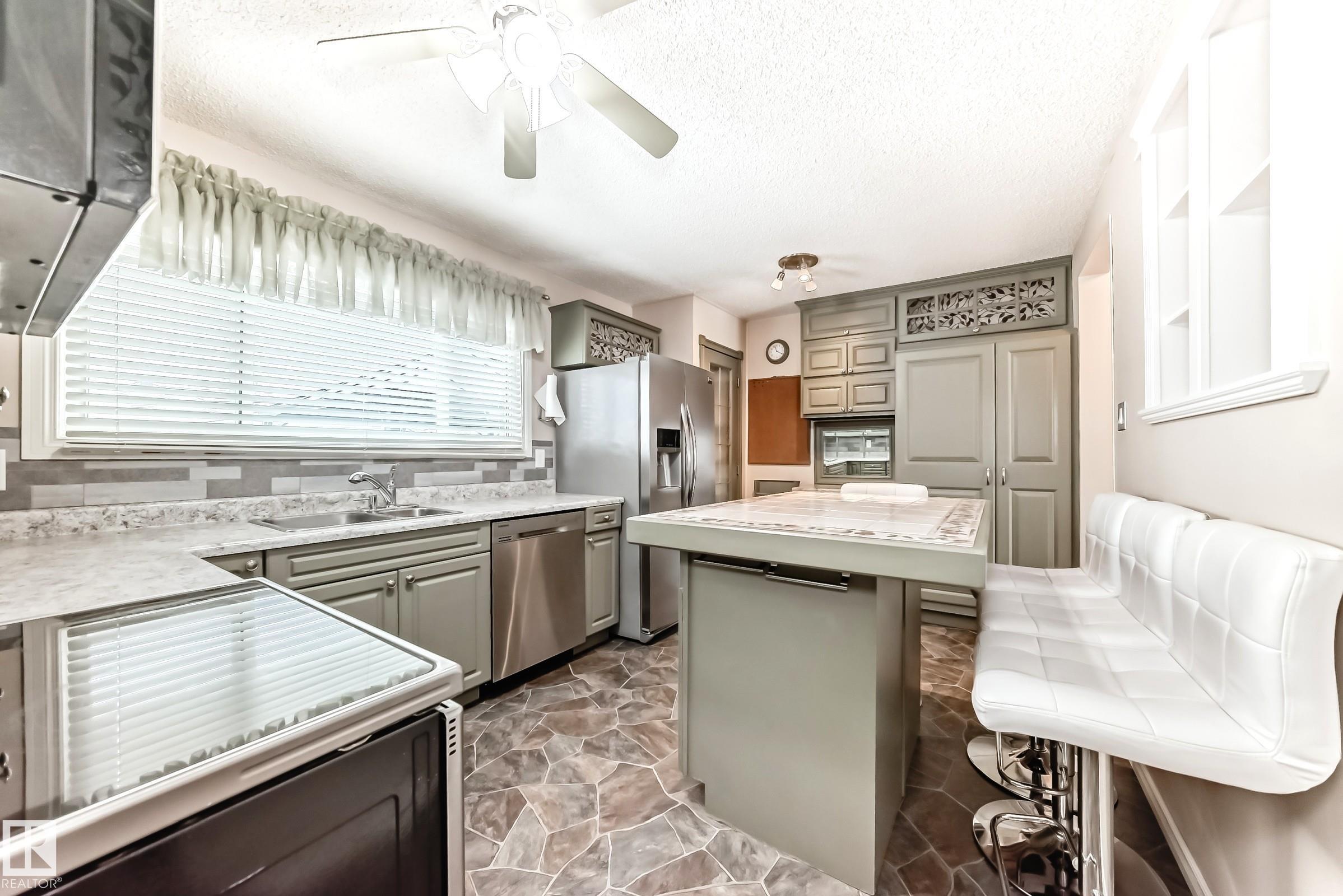 Photo 10 at 13222 83 Street NW, Glengarry, Edmonton