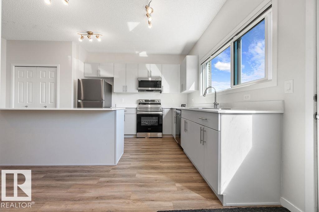 Photo 13 at 7123 46a Street, Le Reve, Beaumont