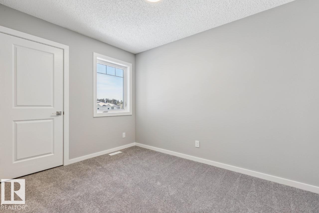 Photo 24 at 306 Hawthorn Way, Woodbend, Leduc