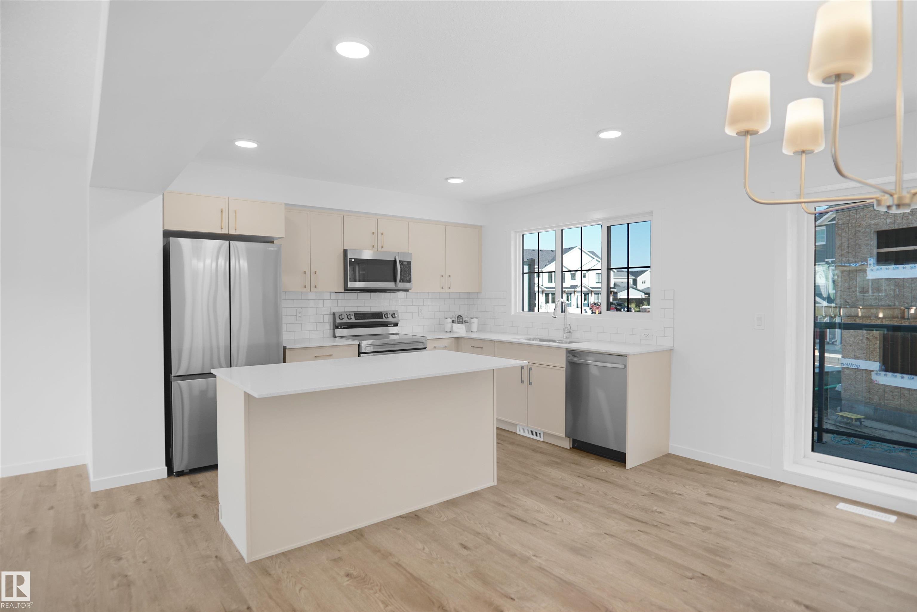 Photo 9 at 54 - 525 Secord Boulevard NW, Secord, Edmonton